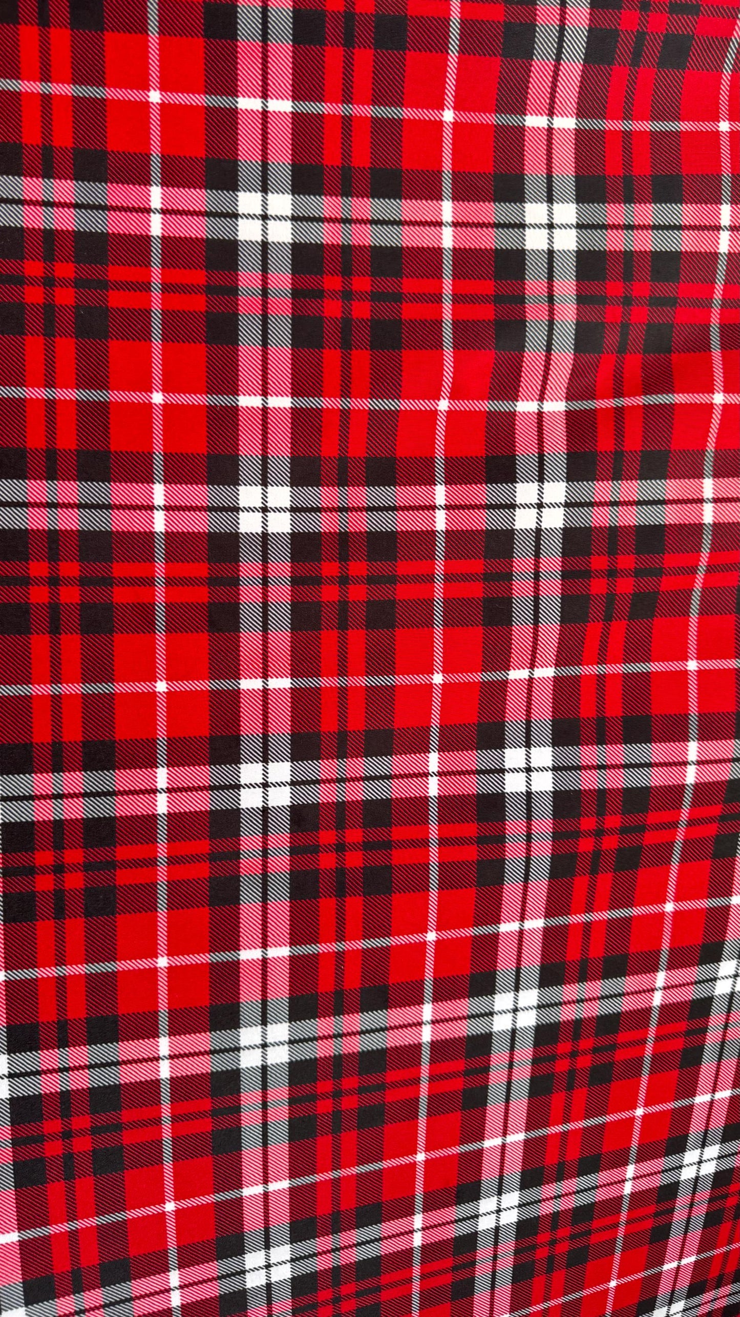 New Plaid design Red/White Print On Heavy Nylon spandex 4-Way 58/60” Sold By The YD. Ships Worldwide From Los Angeles California USA.
