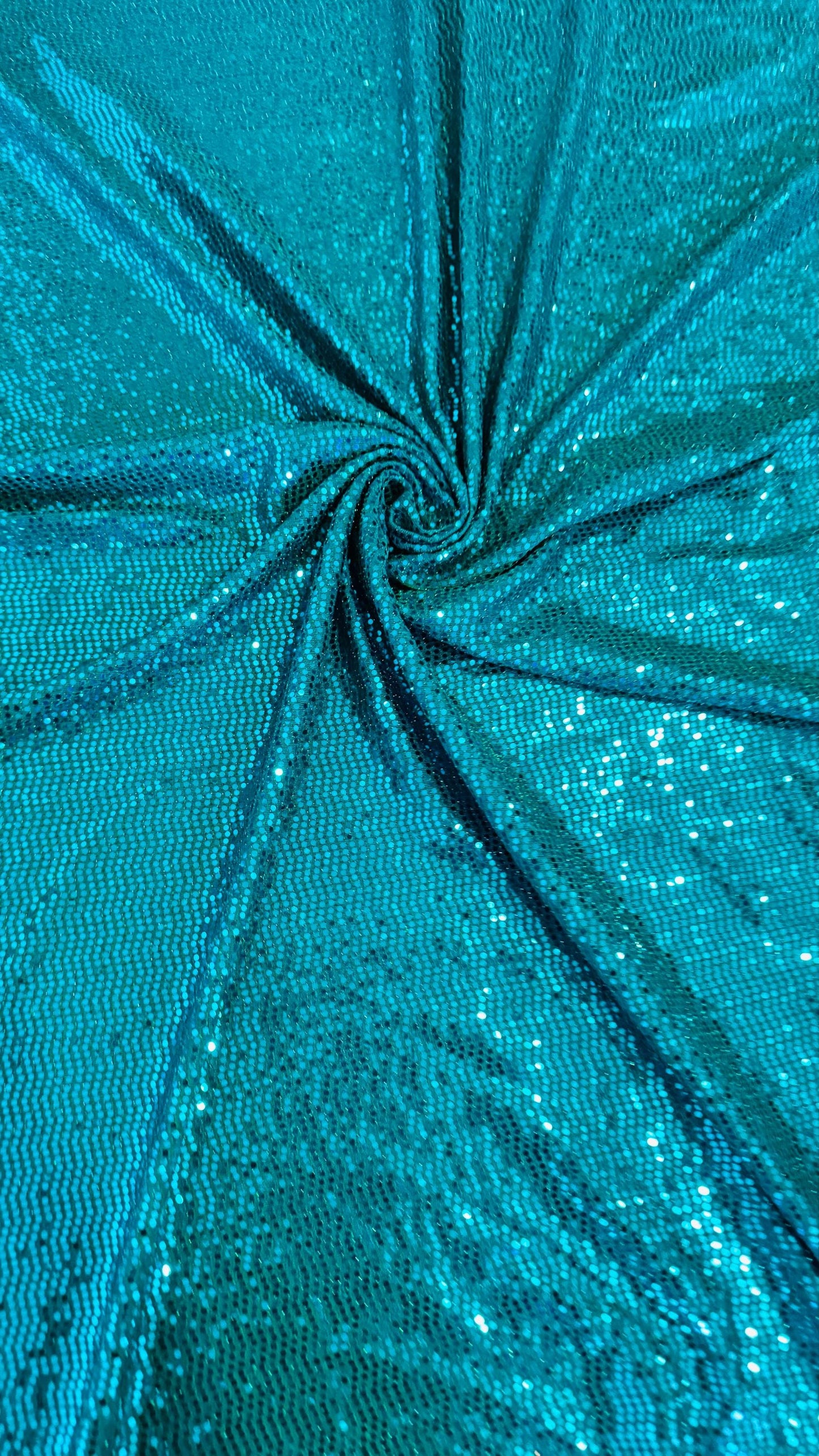 New mini hologram sequins on metallic spandex 4-way stretch 58/60” Sold by the YD. Ships worldwide from Los Ángeles California USA.