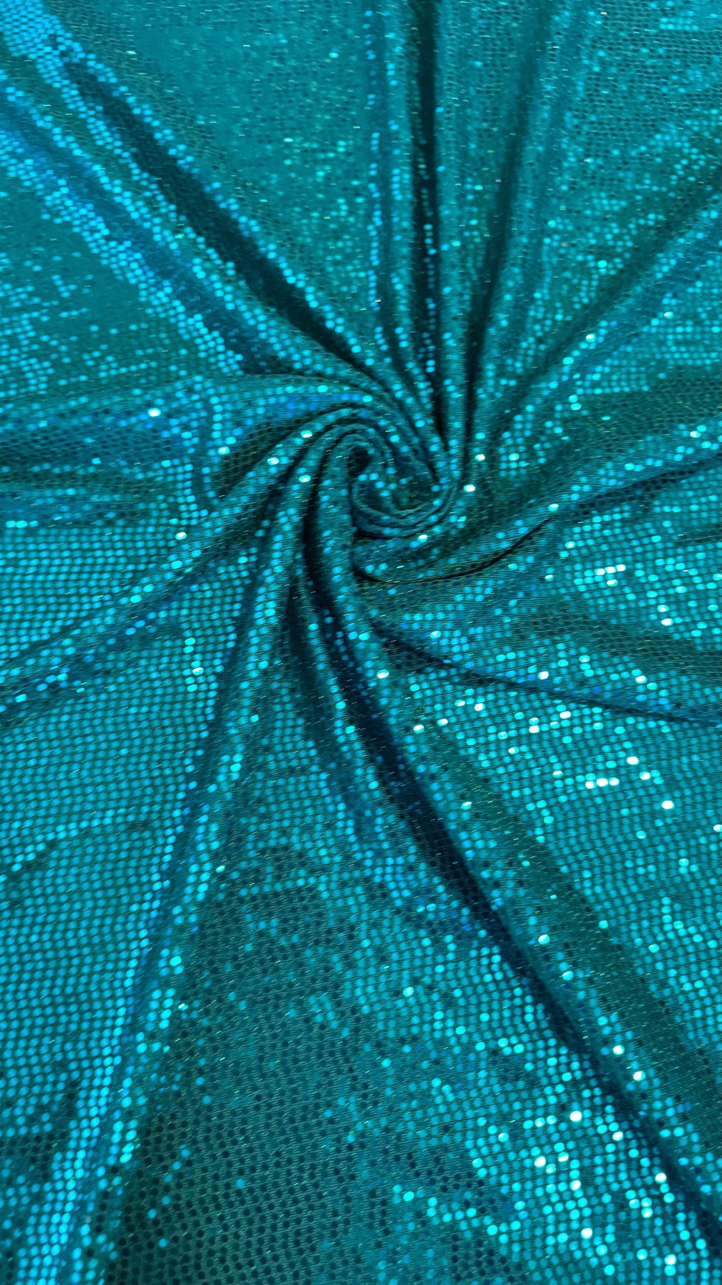 New metallic poly spandex with mini hologram sequins 2-way stretch 58/60” Sold by the YD. Ships worldwide from Los Ángeles California USA.