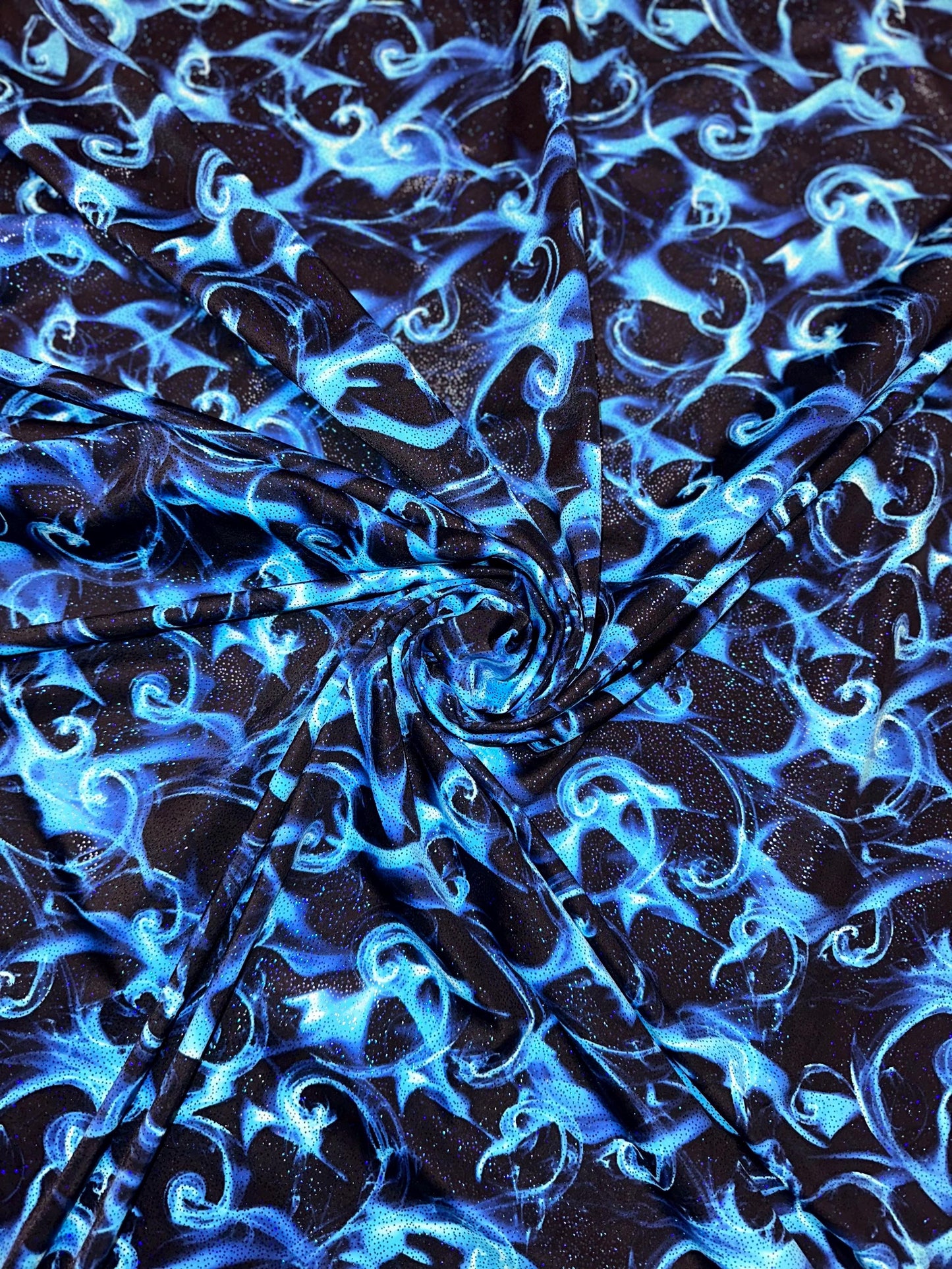 New tornado fire design print on heavy nylon spandex with foggy foil 4way stretch 58/60” Sold by the YD. Ships worldwide from Los Angeles Ca