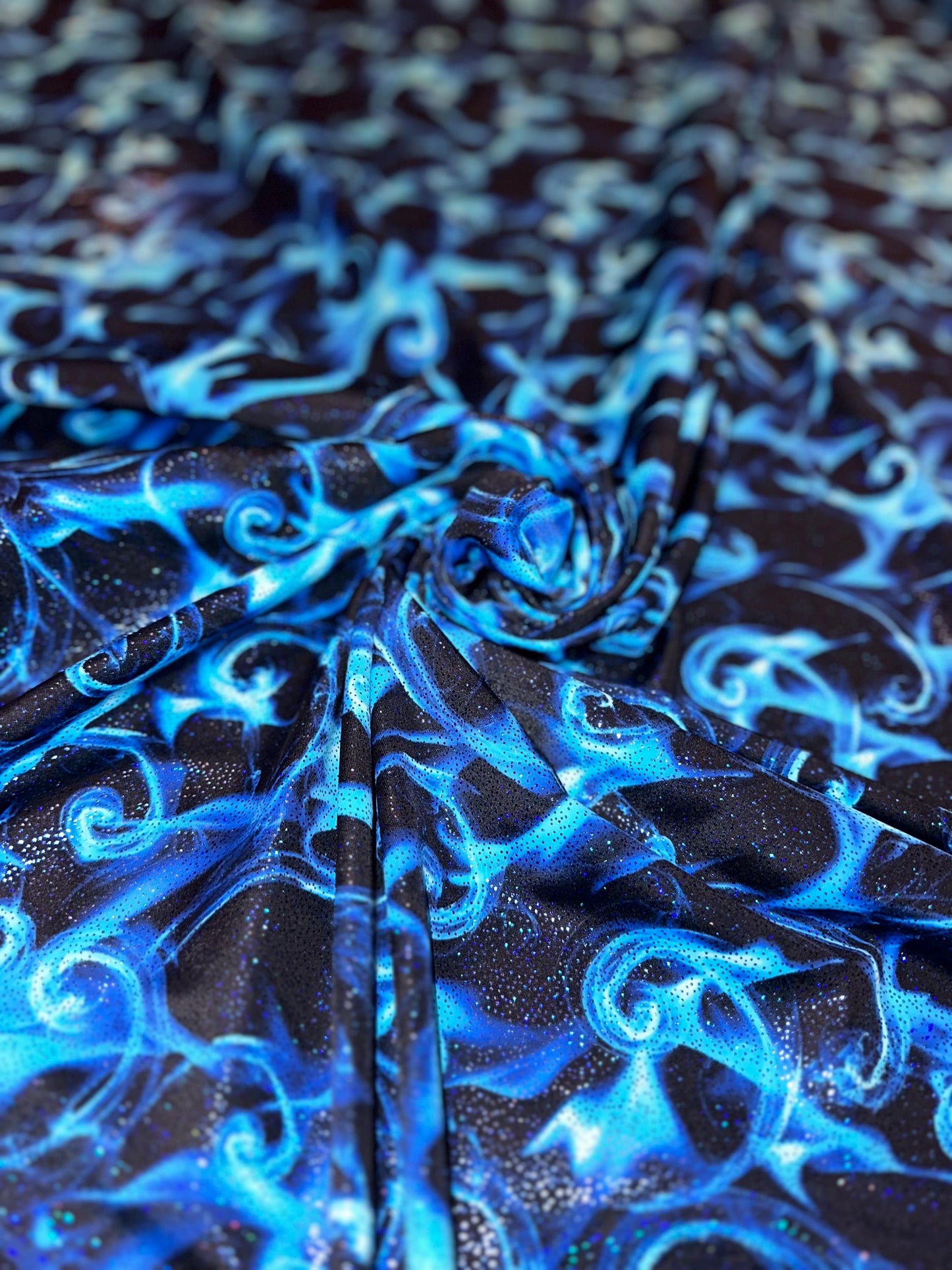 New tornado fire design print on heavy nylon spandex with foggy foil 4way stretch 58/60” Sold by the YD. Ships worldwide from Los Angeles Ca