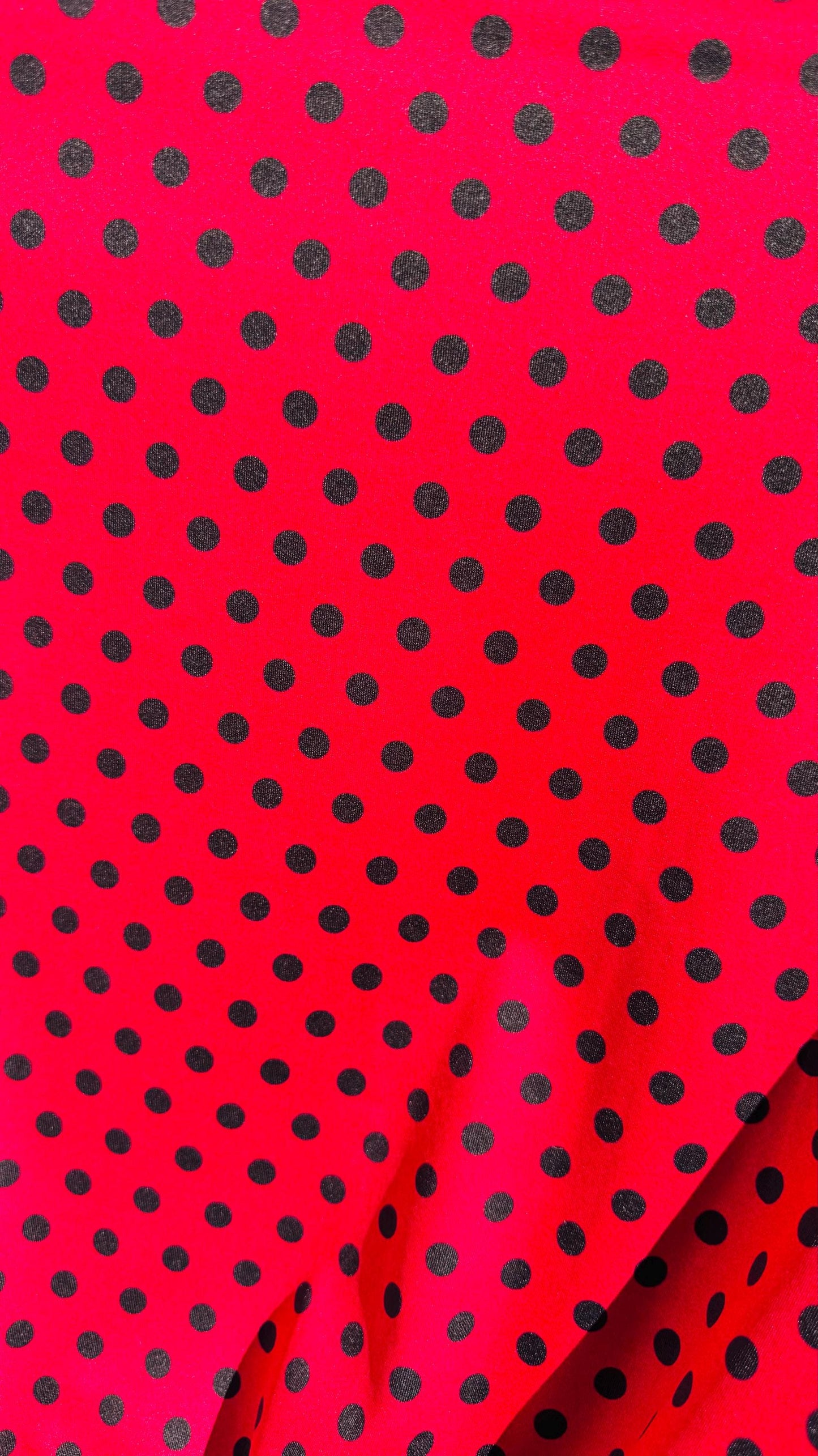 Polka dots design Red/Black print on best quality of Poly spandex 4-way stretch 58/60” Sold by the YD. Ships Worldwide from Los Angeles CA