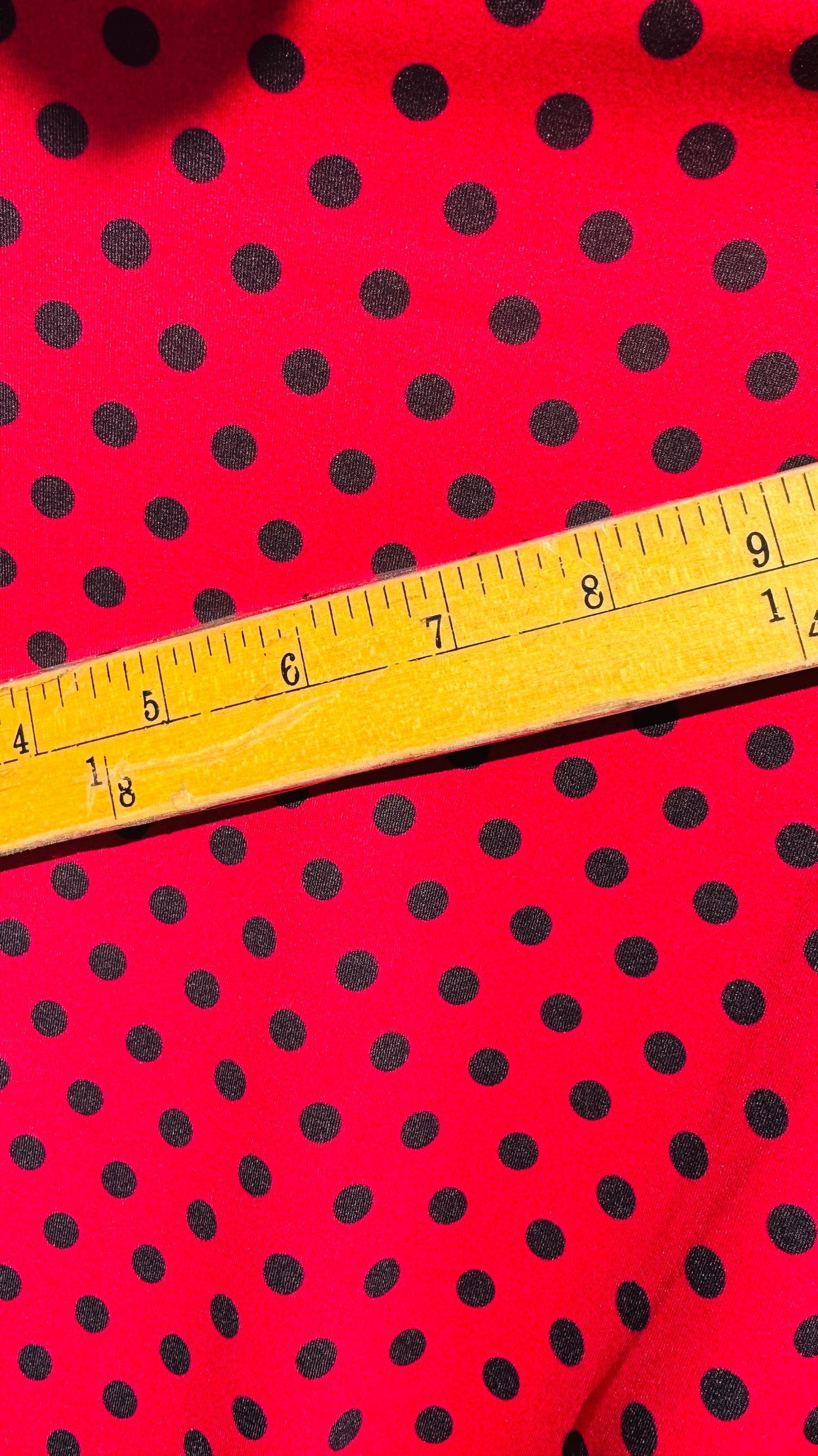 Polka dots design Red/Black print on best quality of Poly spandex 4-way stretch 58/60” Sold by the YD. Ships Worldwide from Los Angeles CA
