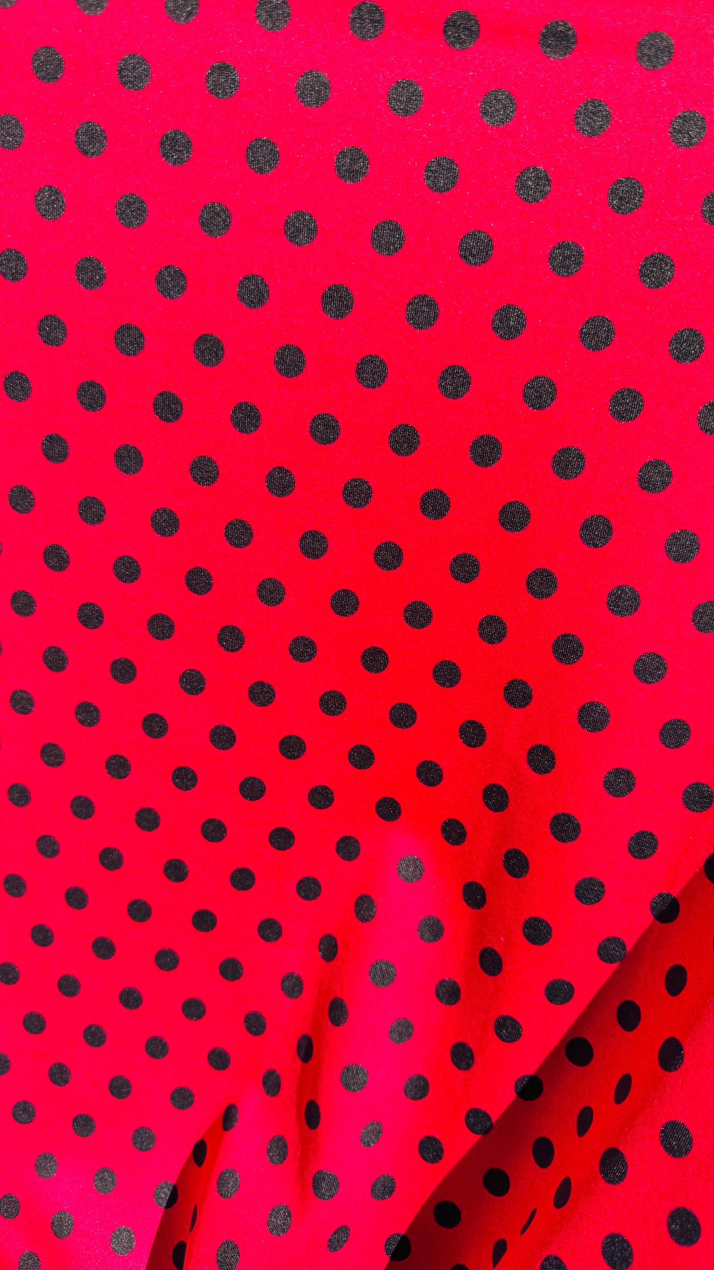 Polka dots design Red/Black print on best quality of Poly spandex 4-way stretch 58/60” Sold by the YD. Ships Worldwide from Los Angeles CA