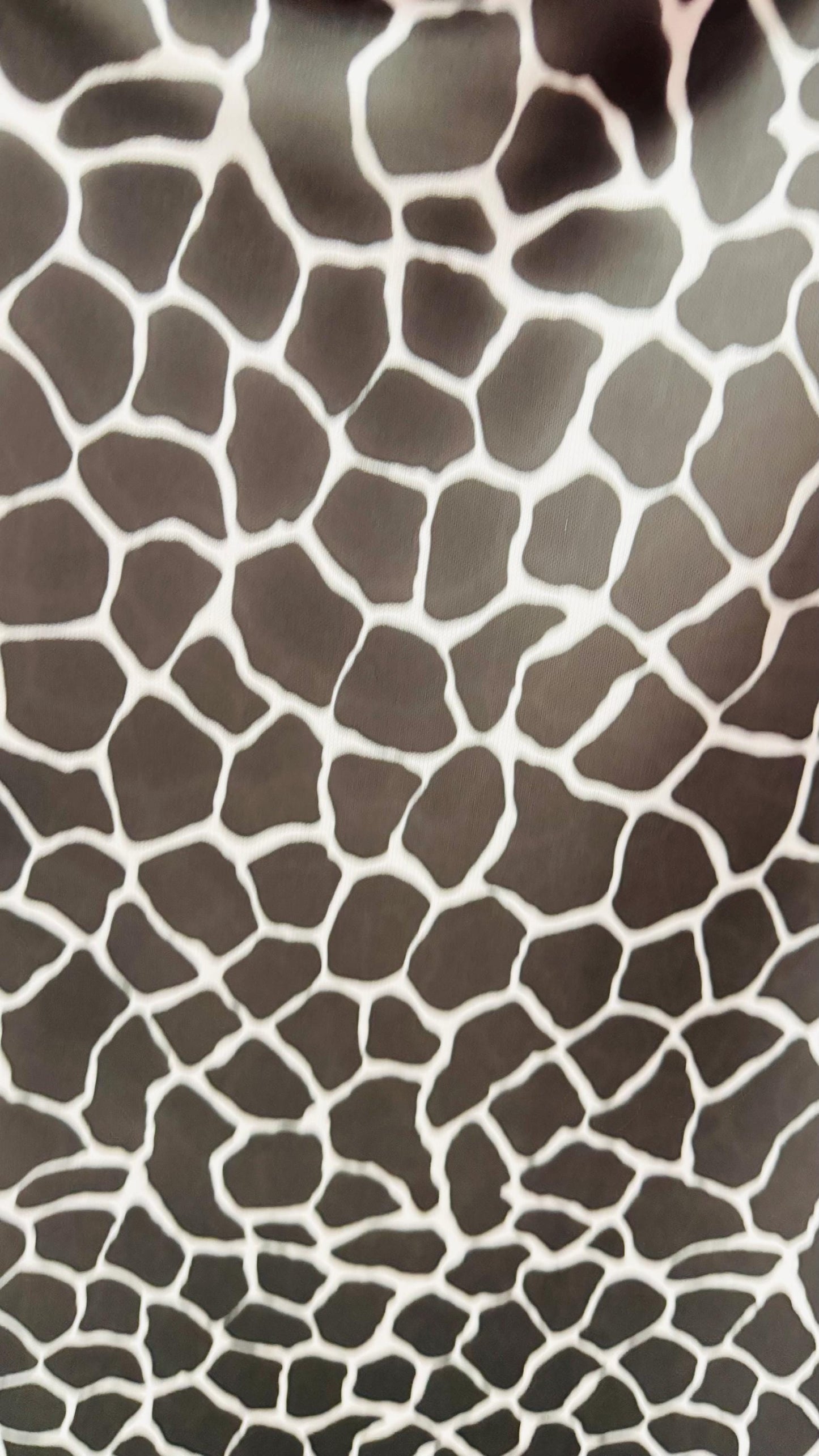 Giraffe design print on power mesh 4-way stretch 58/60” Sold by the YD. Ships Worldwide from Los Angeles California USA.