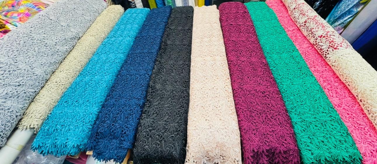 French Guipuir floral design non stretch 50/52" 100% poly sold by the YD. Ships worldwide from Los Angeles California United States.