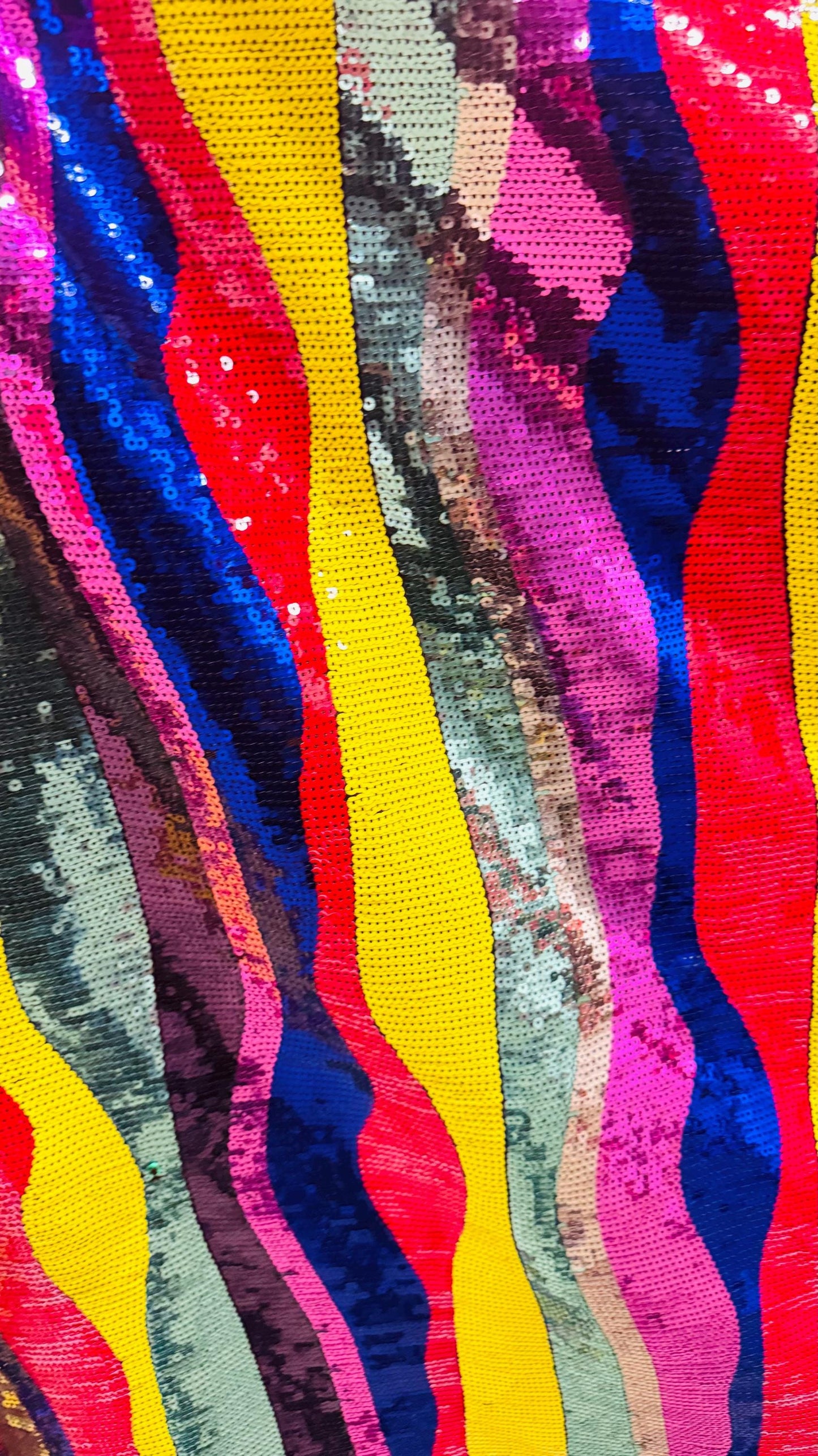 New modern wavy design trans sequins on 2-way stretch mesh 54/55” Sold by the YD. Ships worldwide from Los Angeles California USA.