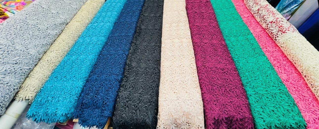 French Guipuir floral design non stretch 50/52" 100% poly sold by the YD. Ships worldwide from Los Angeles California United States.