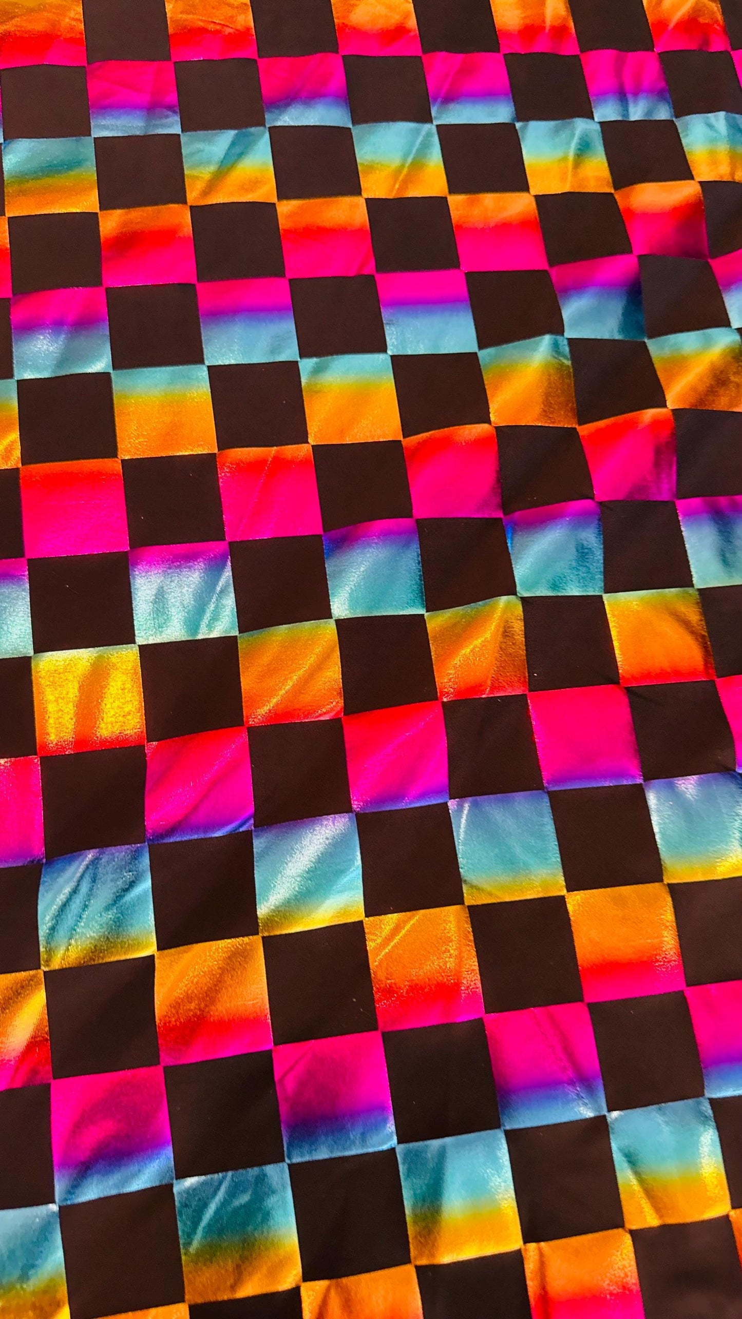 Square Rainbow all over foil poly spandex 2-way stretch 58/60” Sold by the YD. Ships worldwide from Los Angeles California USA.