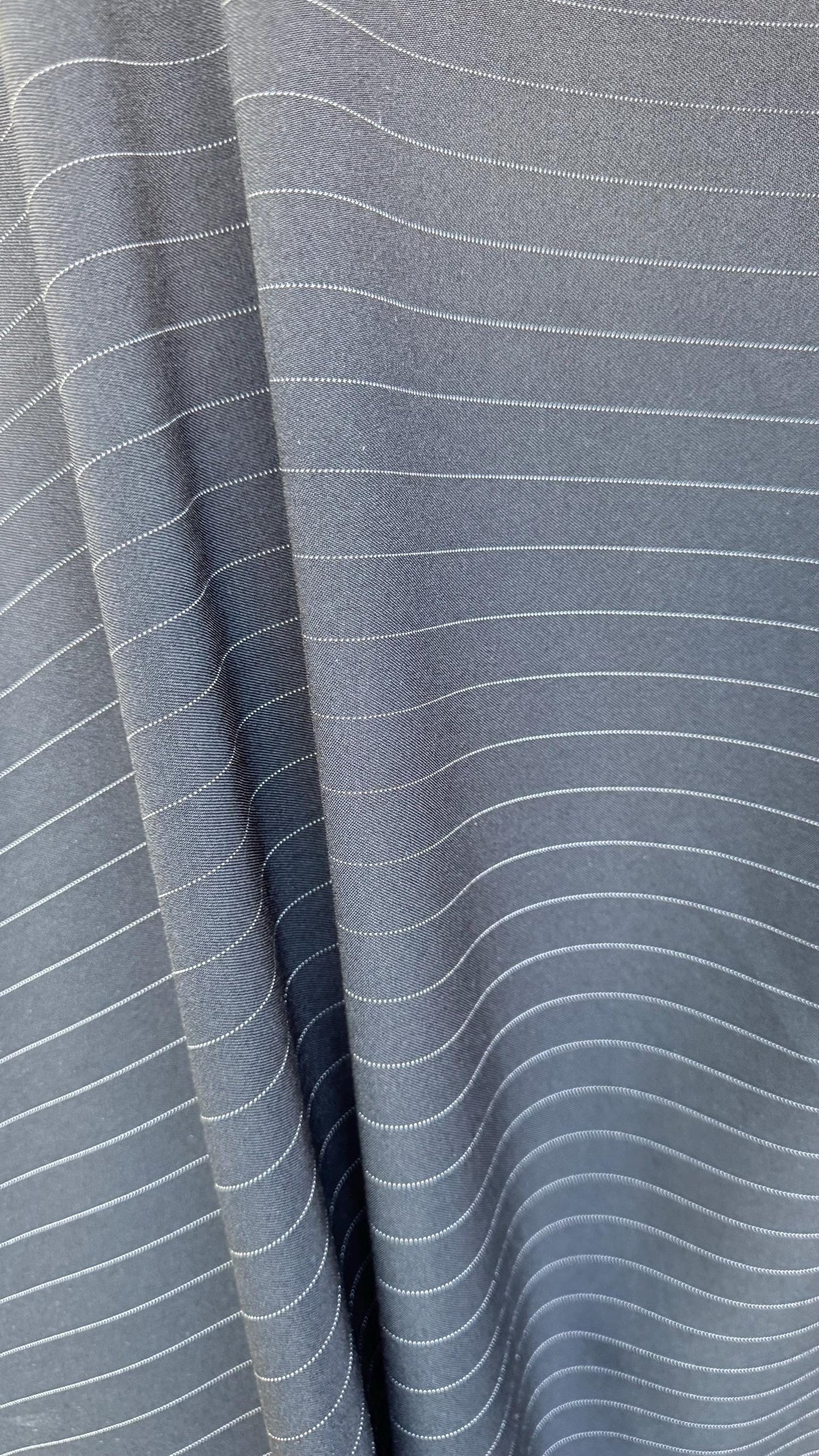 Pin stripes on poly spandex 2-way stretch 58/60” Sold by the YD. Ships worldwide from Los Angeles California USA. High quality fabrics