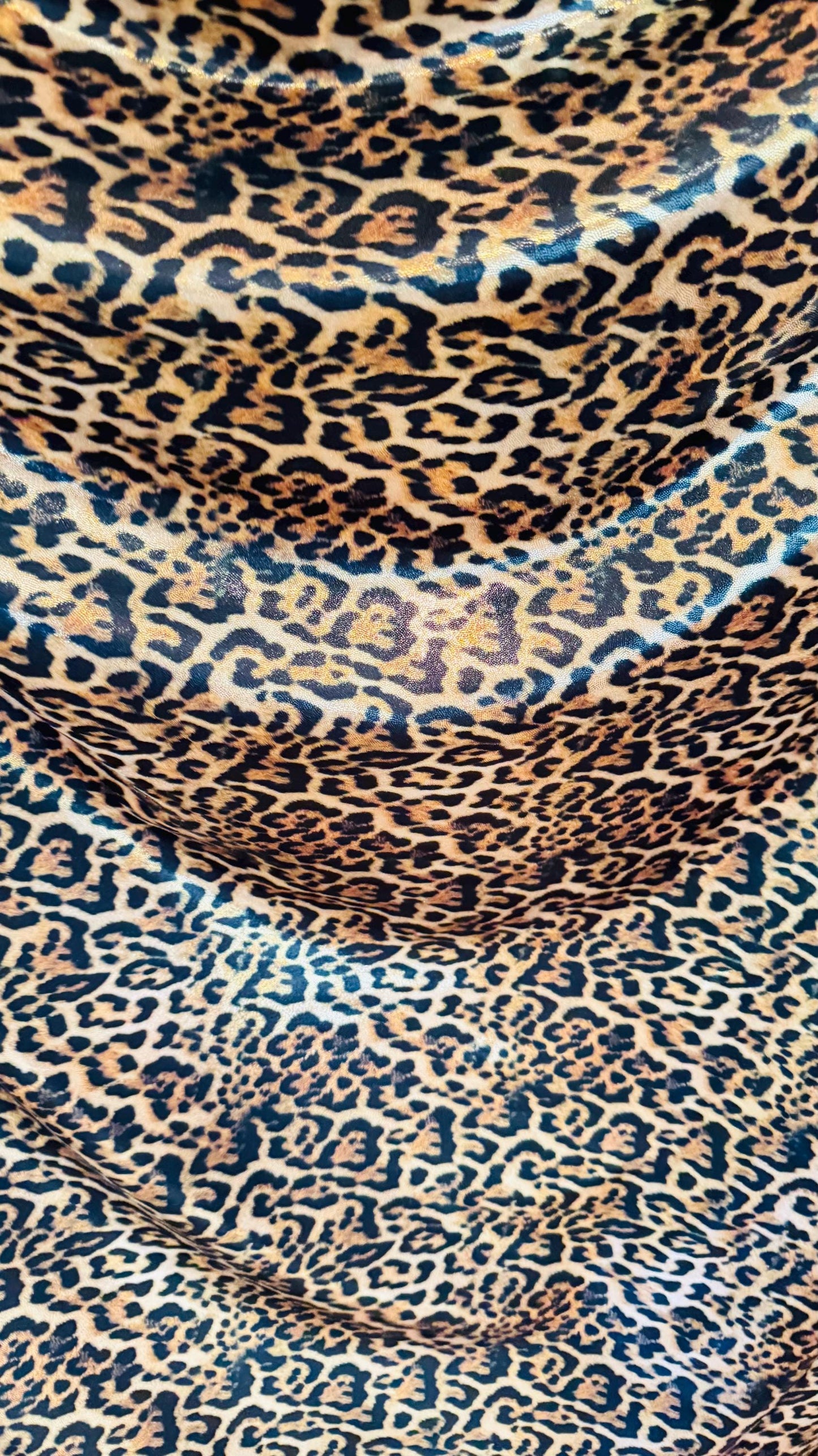 New Jaguar design metallic nylon spandex with foggy foil 4-way stretch i 58/60” Sold by the YD. Ships worldwide from Los Angeles California