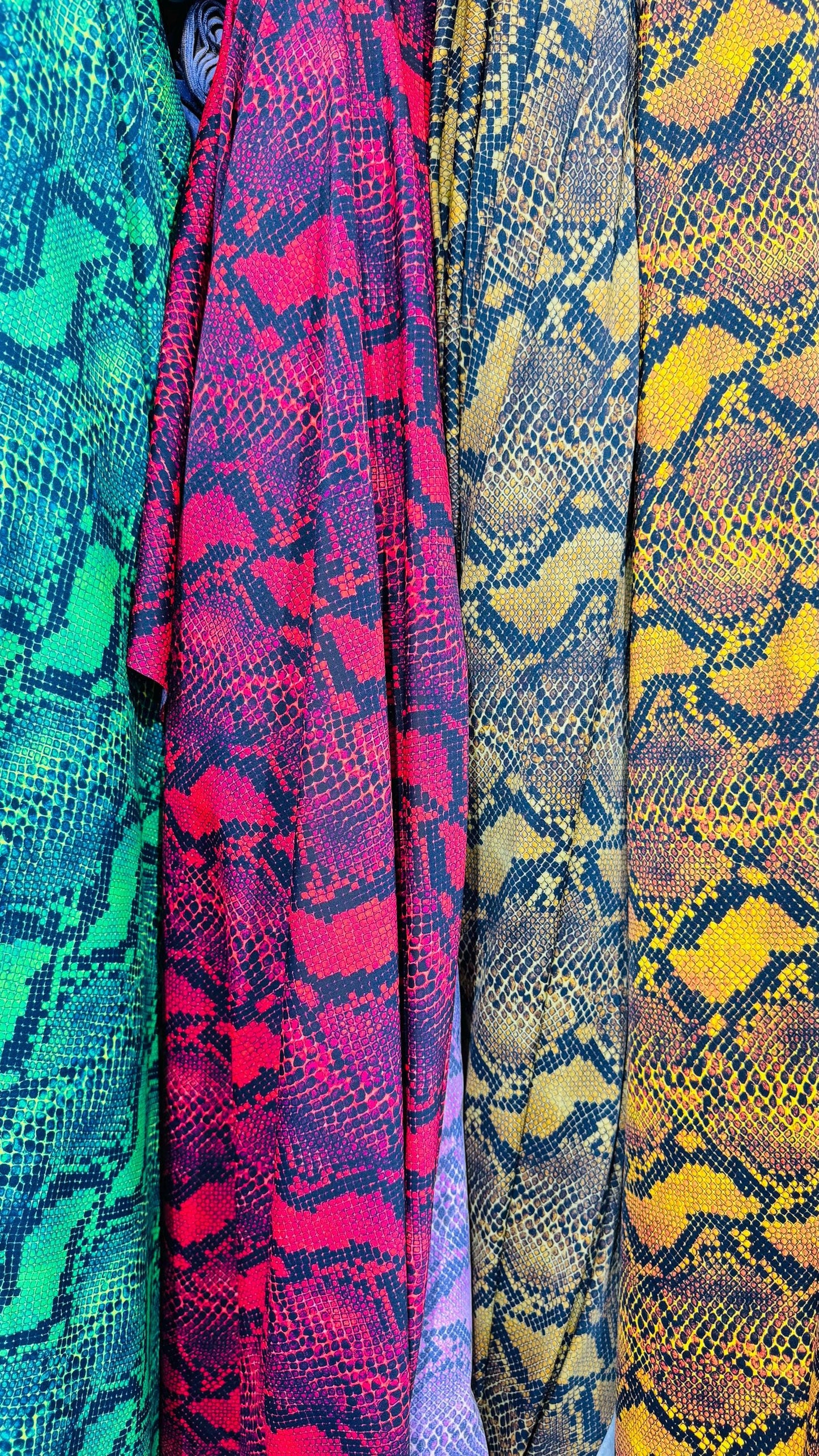 New Python Snake design print on heavy weight nylon spandex 4way stretch 58/60" Sold by the YD. Ships worldwide from Los Angeles California