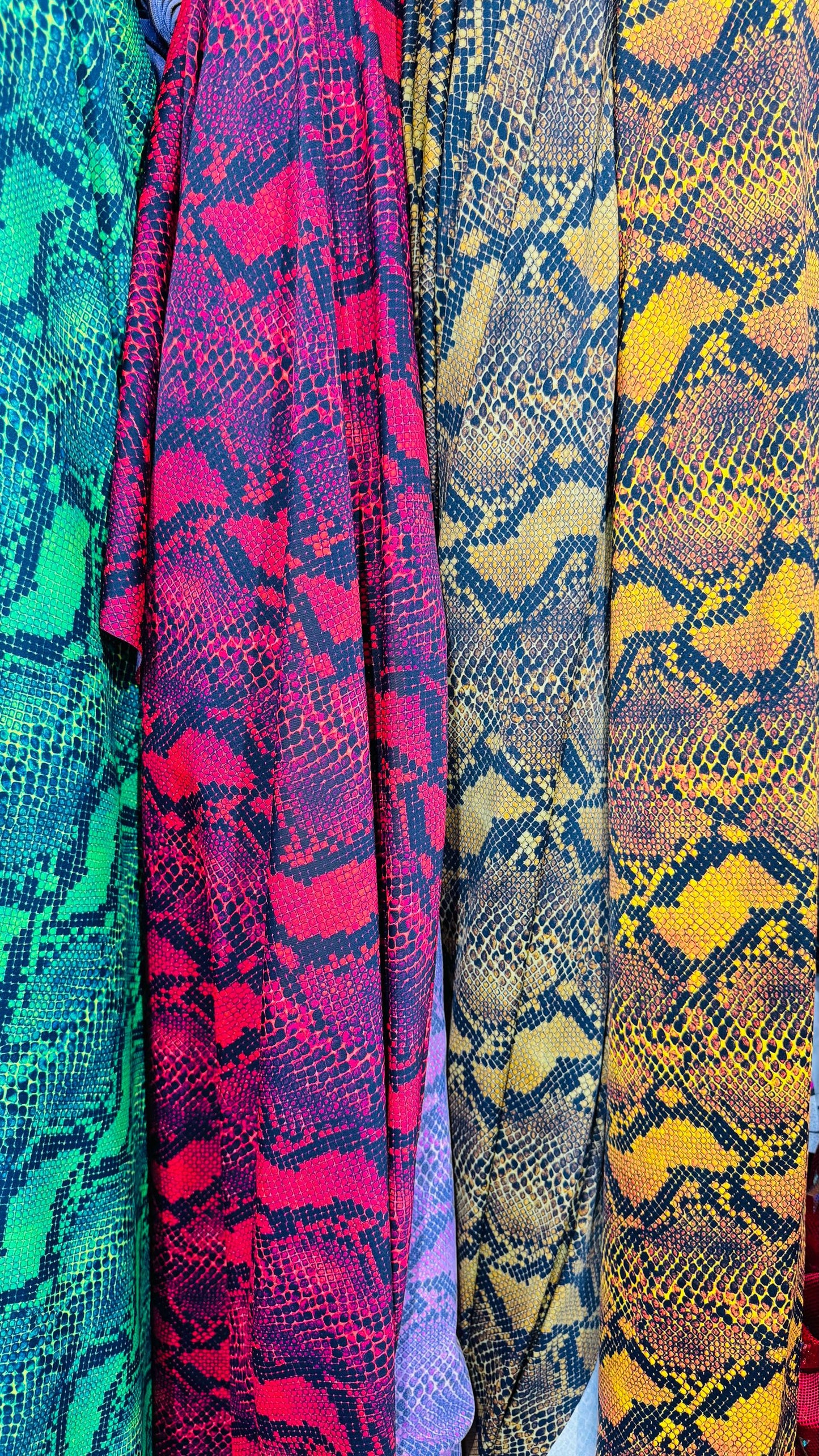 New Python Snake design print on heavy weight nylon spandex 4way stretch 58/60" Sold by the YD. Ships worldwide from Los Angeles California