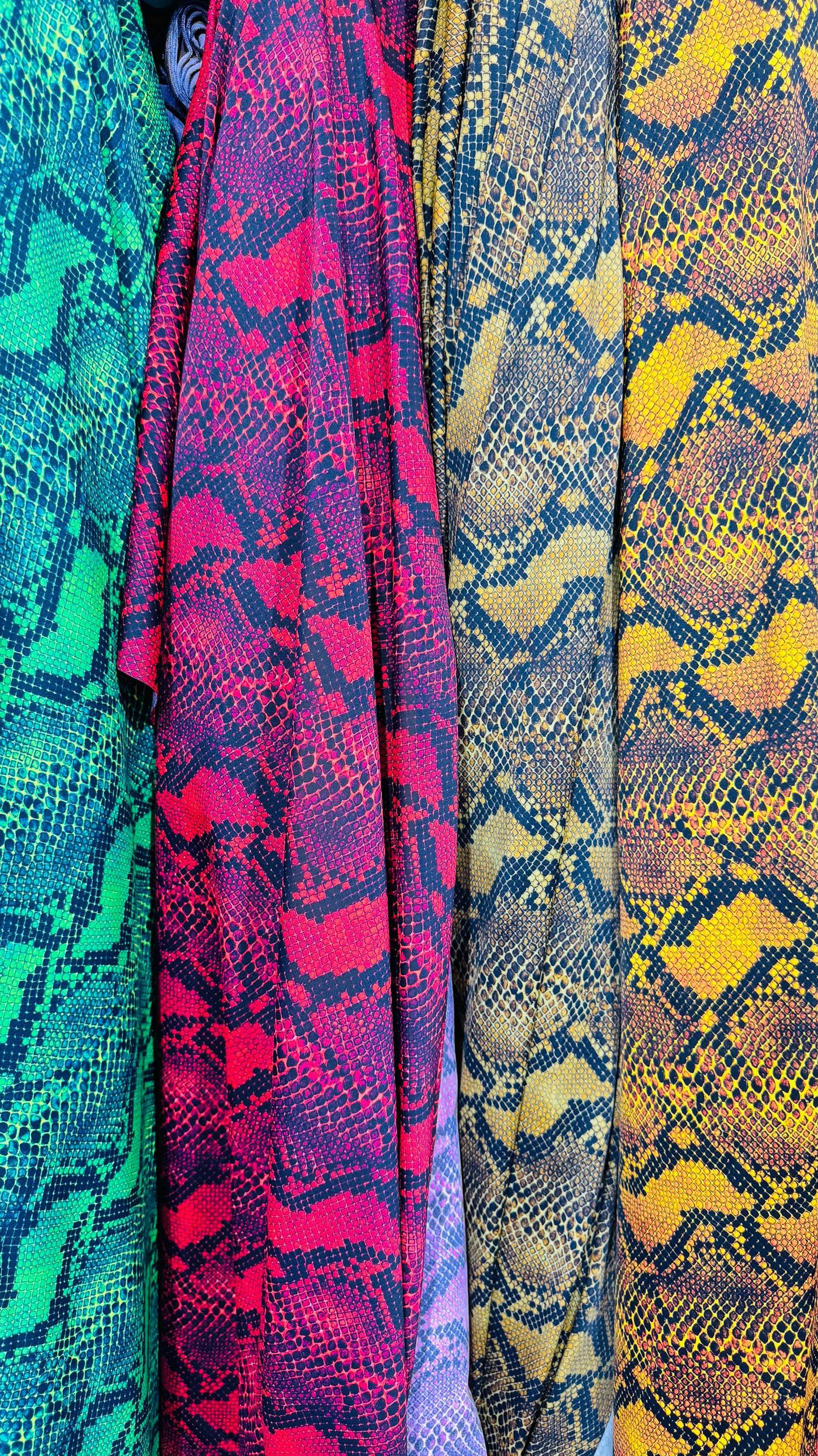 New Python Snake design print on heavy weight nylon spandex 4way stretch 58/60" Sold by the YD. Ships worldwide from Los Angeles California