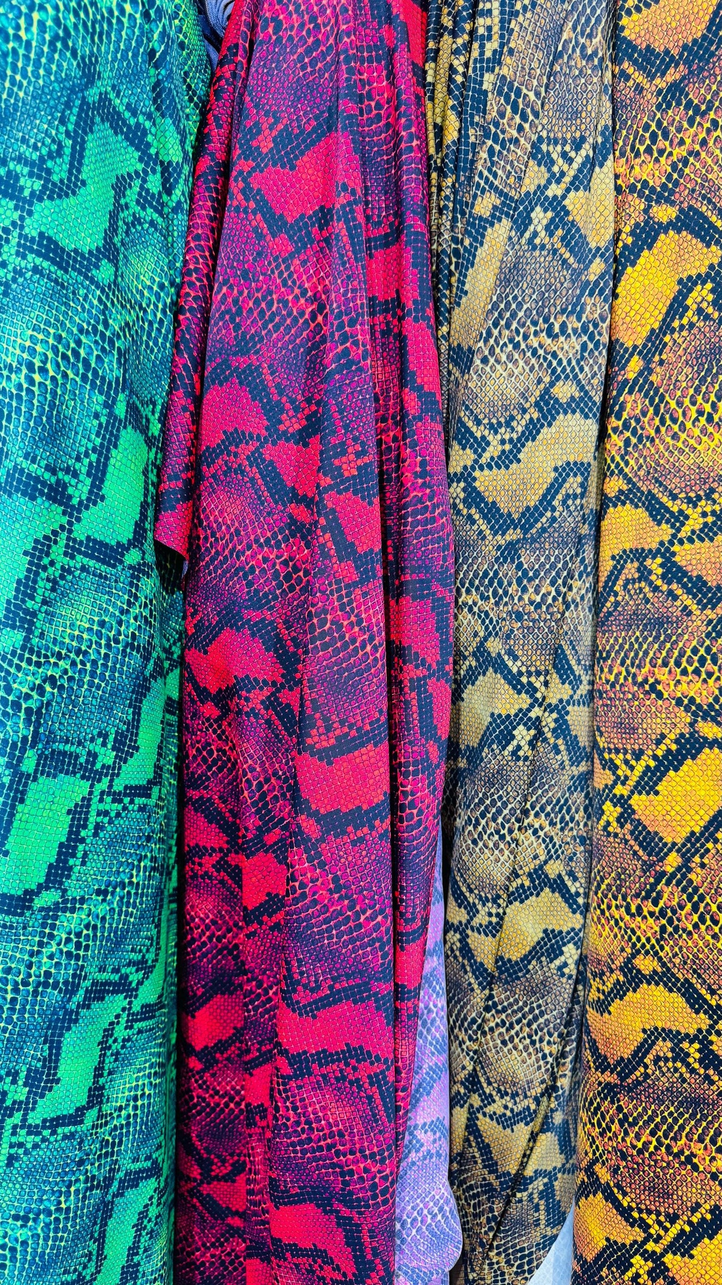 New Python Snake design print on heavy weight nylon spandex 4way stretch 58/60" Sold by the YD. Ships worldwide from Los Angeles California