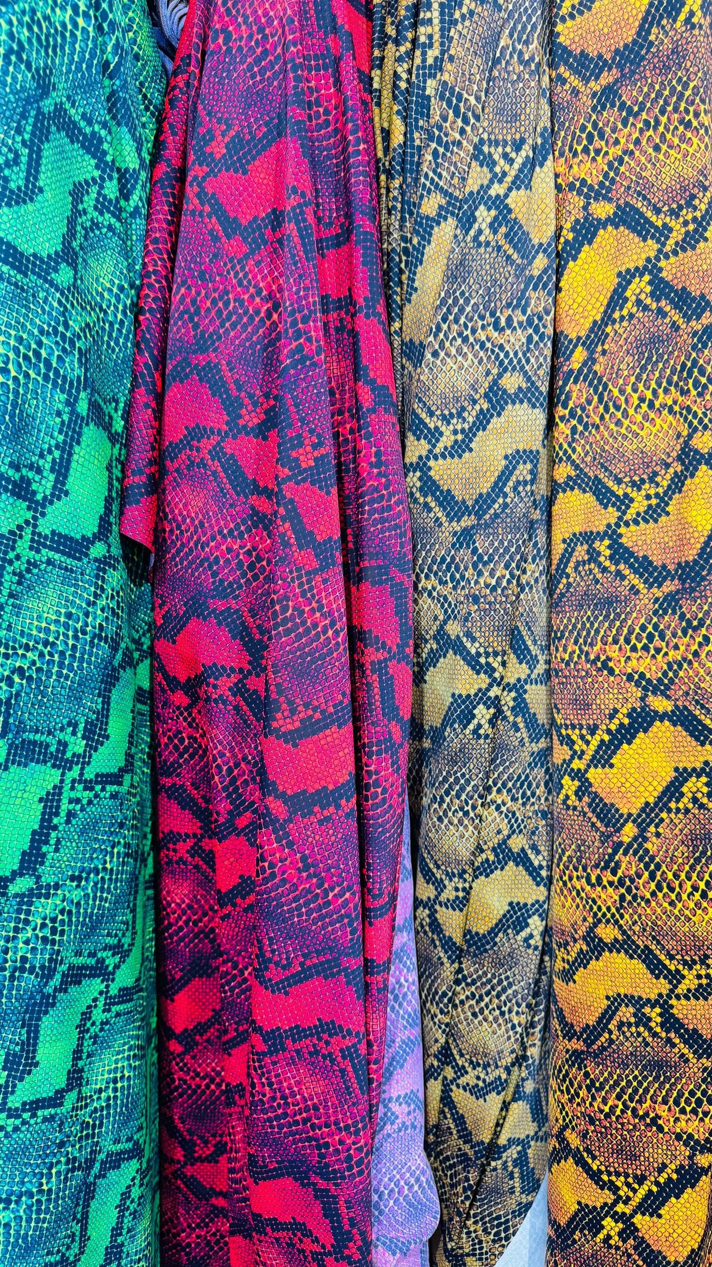 New Python Snake design print on heavy weight nylon spandex 4way stretch 58/60" Sold by the YD. Ships worldwide from Los Angeles California