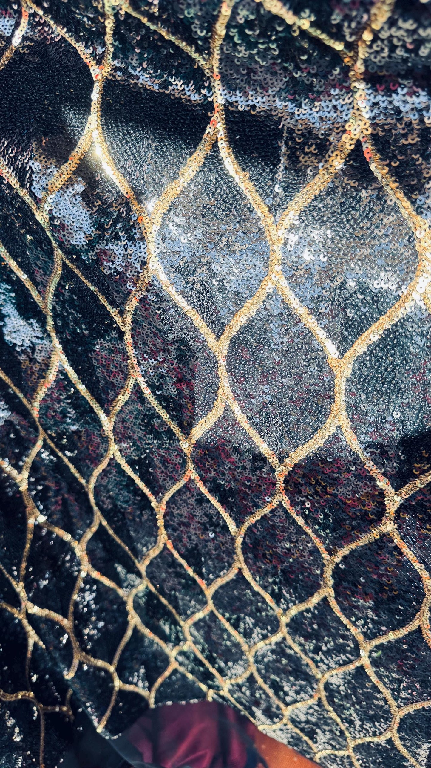Abstract design cosmic glitz sequins Black/Gold on stretch mesh 2-way 52/54” Sold by the yd Ships worldwide from Los Angeles California USA