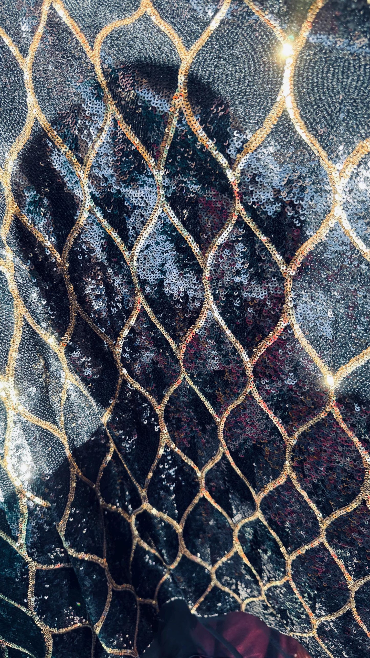 Abstract design cosmic glitz sequins Black/Gold on stretch mesh 2-way 52/54” Sold by the yd Ships worldwide from Los Angeles California USA