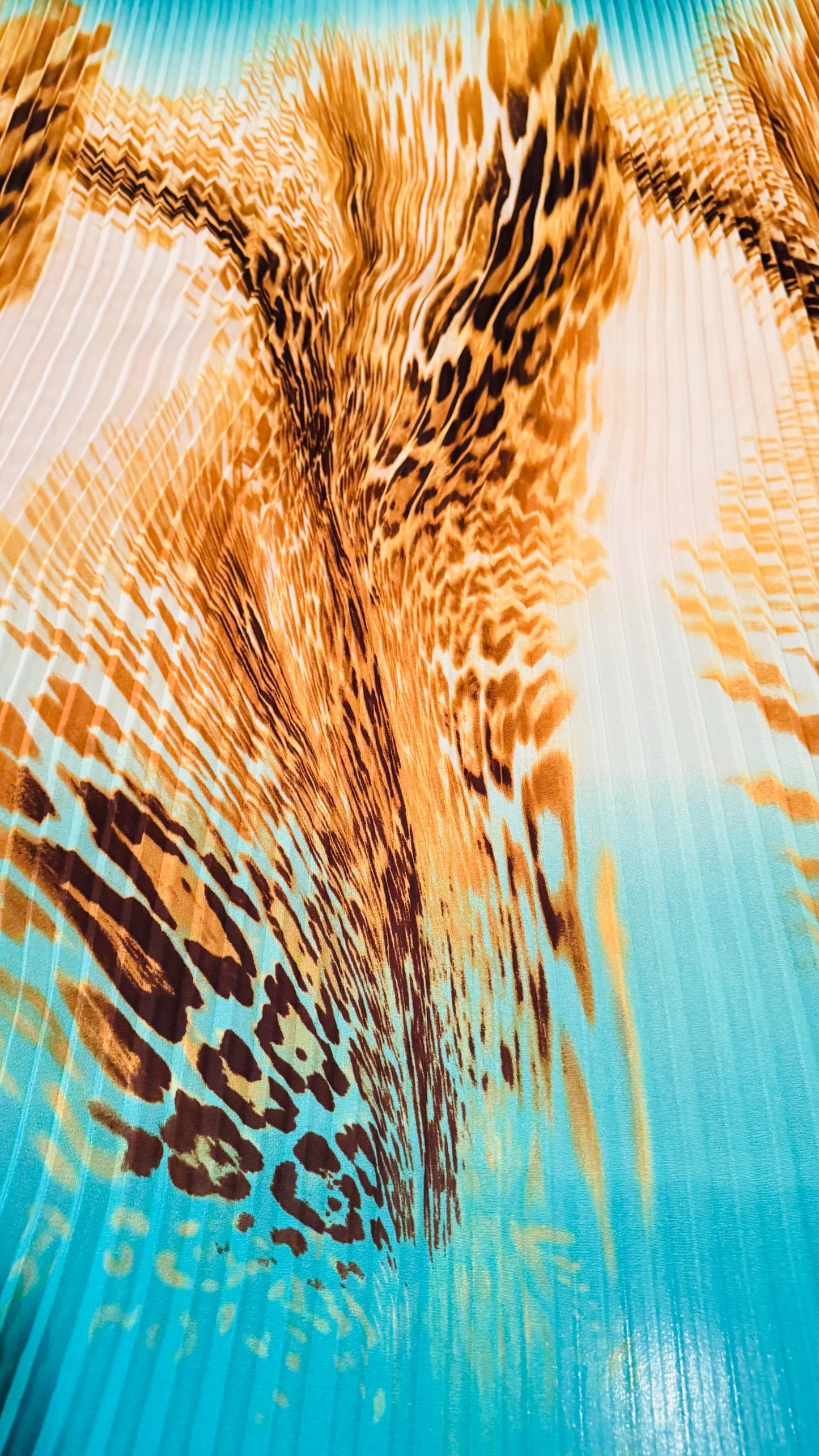 New 1/2” accordion pleaded Ombre chiffon exotic Hiding leopard design 58/60” Sold by the YD. Ships worldwide from Los Angeles California