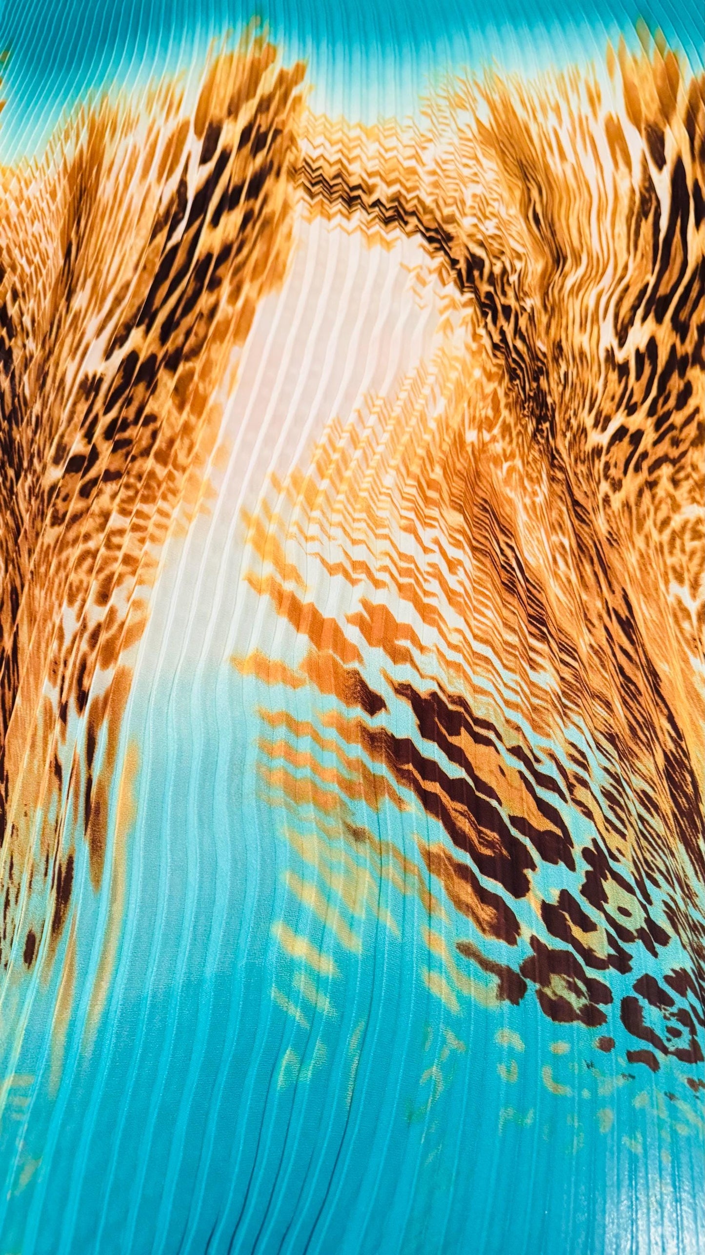 New 1/2” accordion pleaded Ombre chiffon exotic Hiding leopard design 58/60” Sold by the YD. Ships worldwide from Los Angeles California