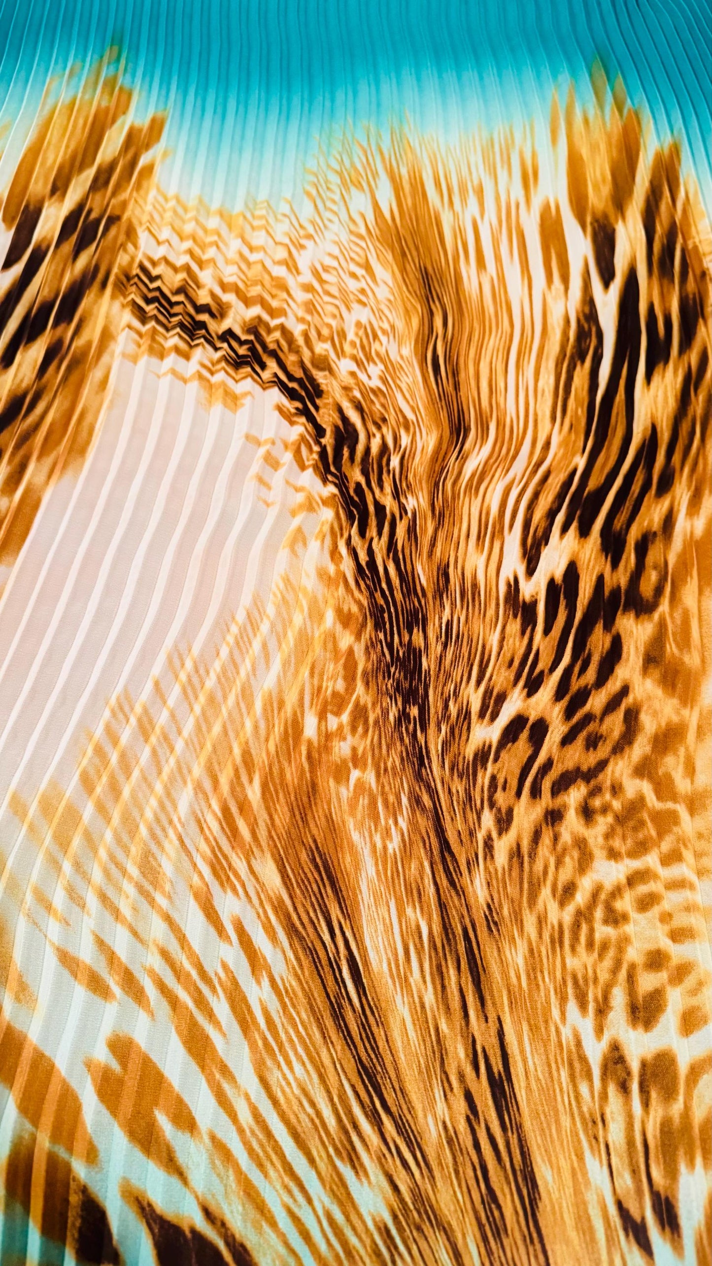 New 1/2” accordion pleaded Ombre chiffon exotic Hiding leopard design 58/60” Sold by the YD. Ships worldwide from Los Angeles California