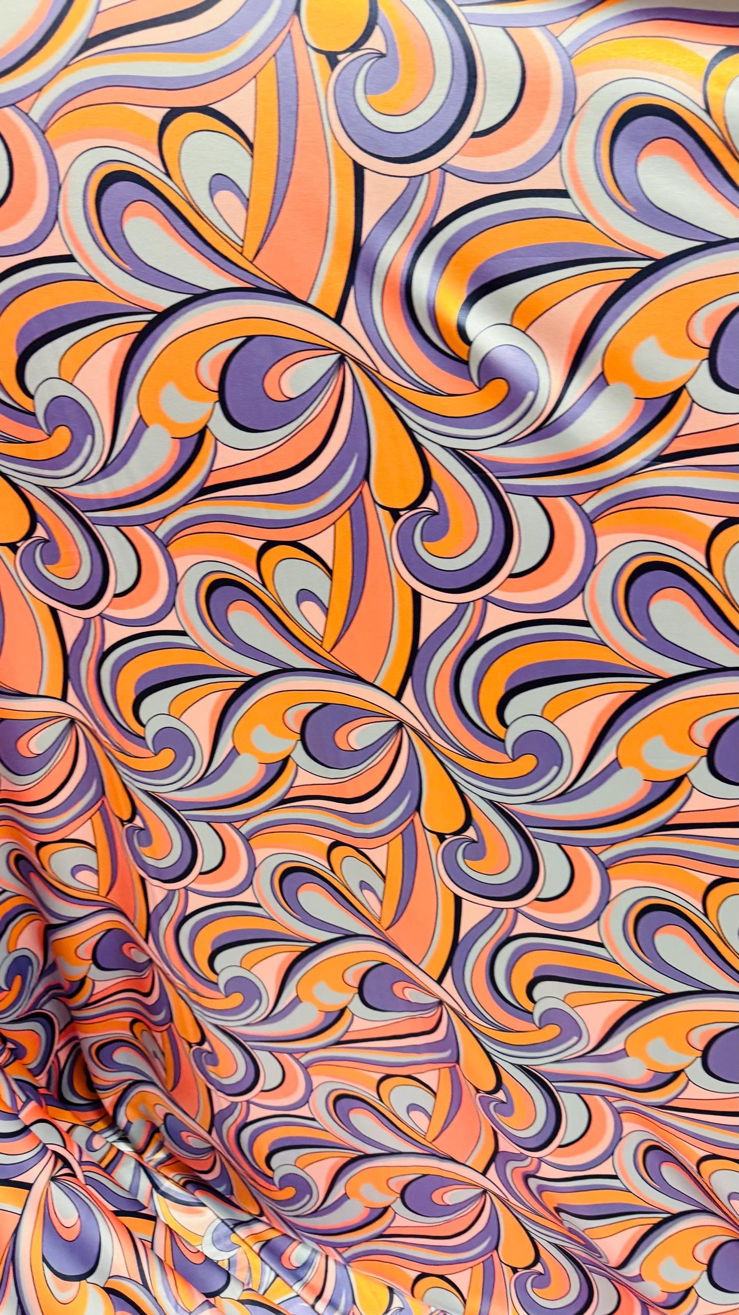 New Paisley Abstract design multicolor super Shiny poly spandex 4way stretch 58/60" Sold by the YD. Ships worldwide from Los Angeles Califo