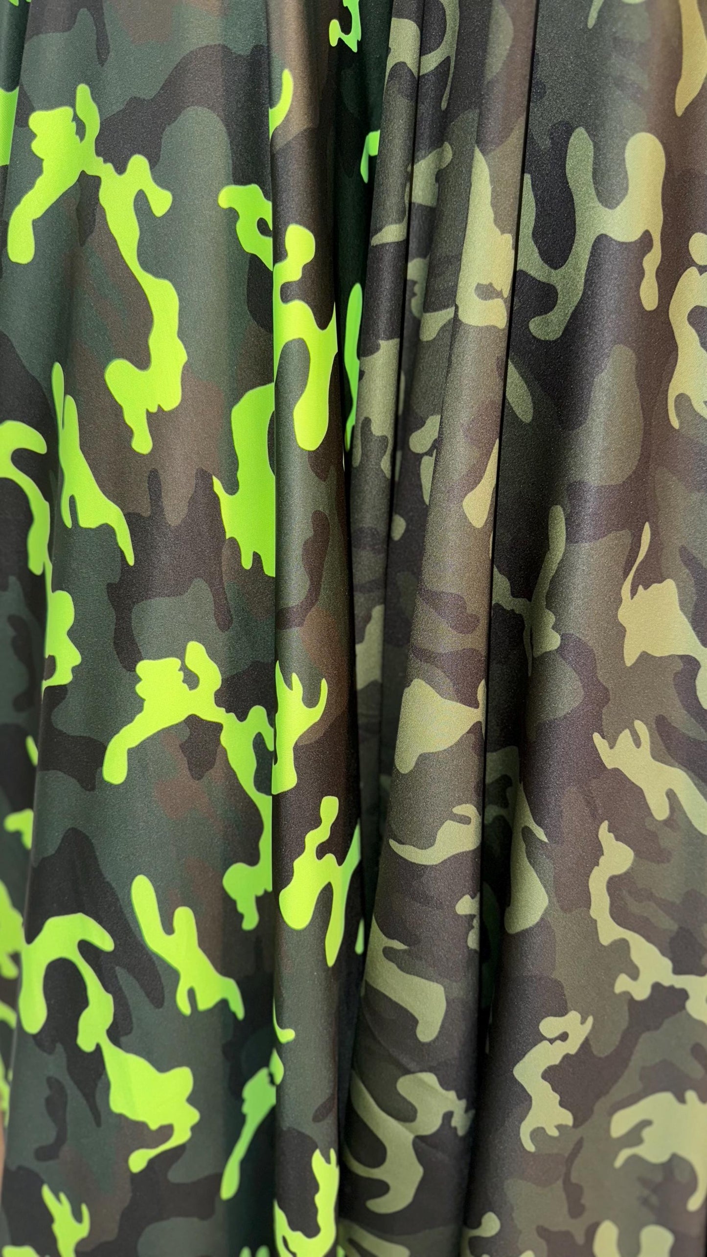 Camouflage design on great quality nylon spandex print 4way Stretch 64/65" Sold by the yd. Ships worldwide from Los Angeles California USA.