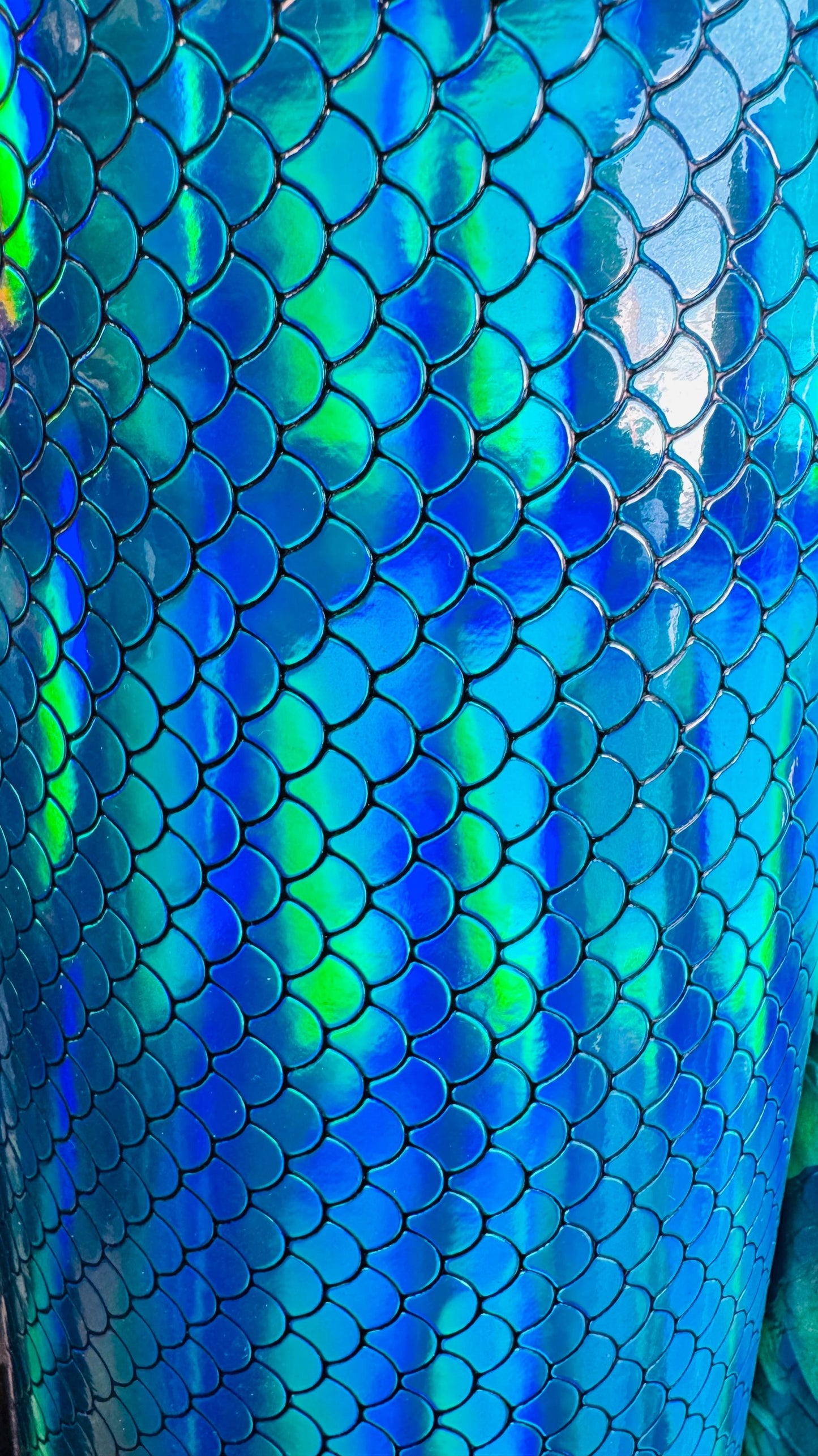 New Exotic Mermaid design super Iridescent vinyl with fish scales 55/56” Sold by the YD. Ships Worldwide from Los Angeles California USA.