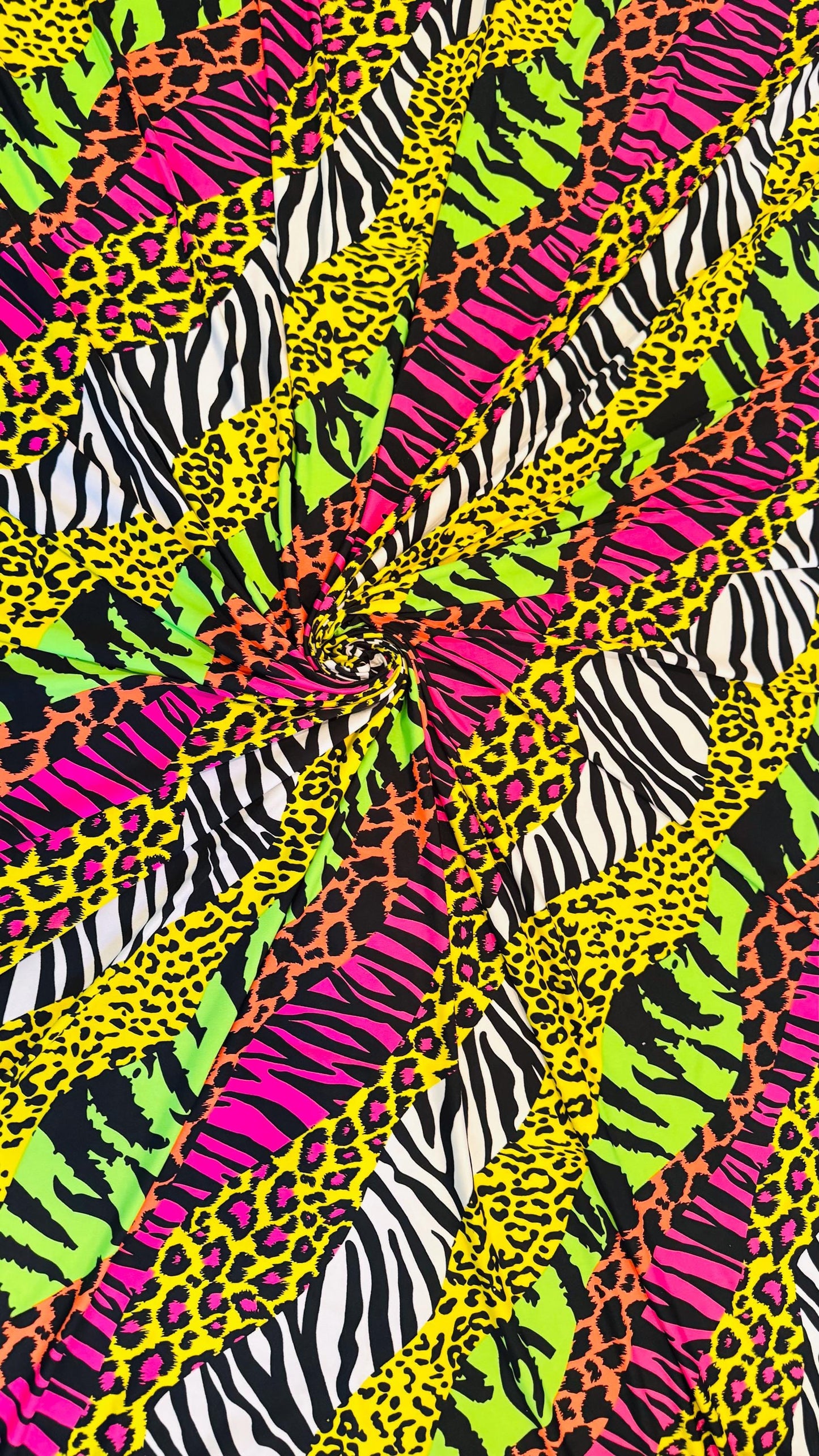 New safari design multi patch work multicolor print on poly spandex 4way stretch 58/60" Sold by the YD. Ships worldwide from Los Ángeles CA