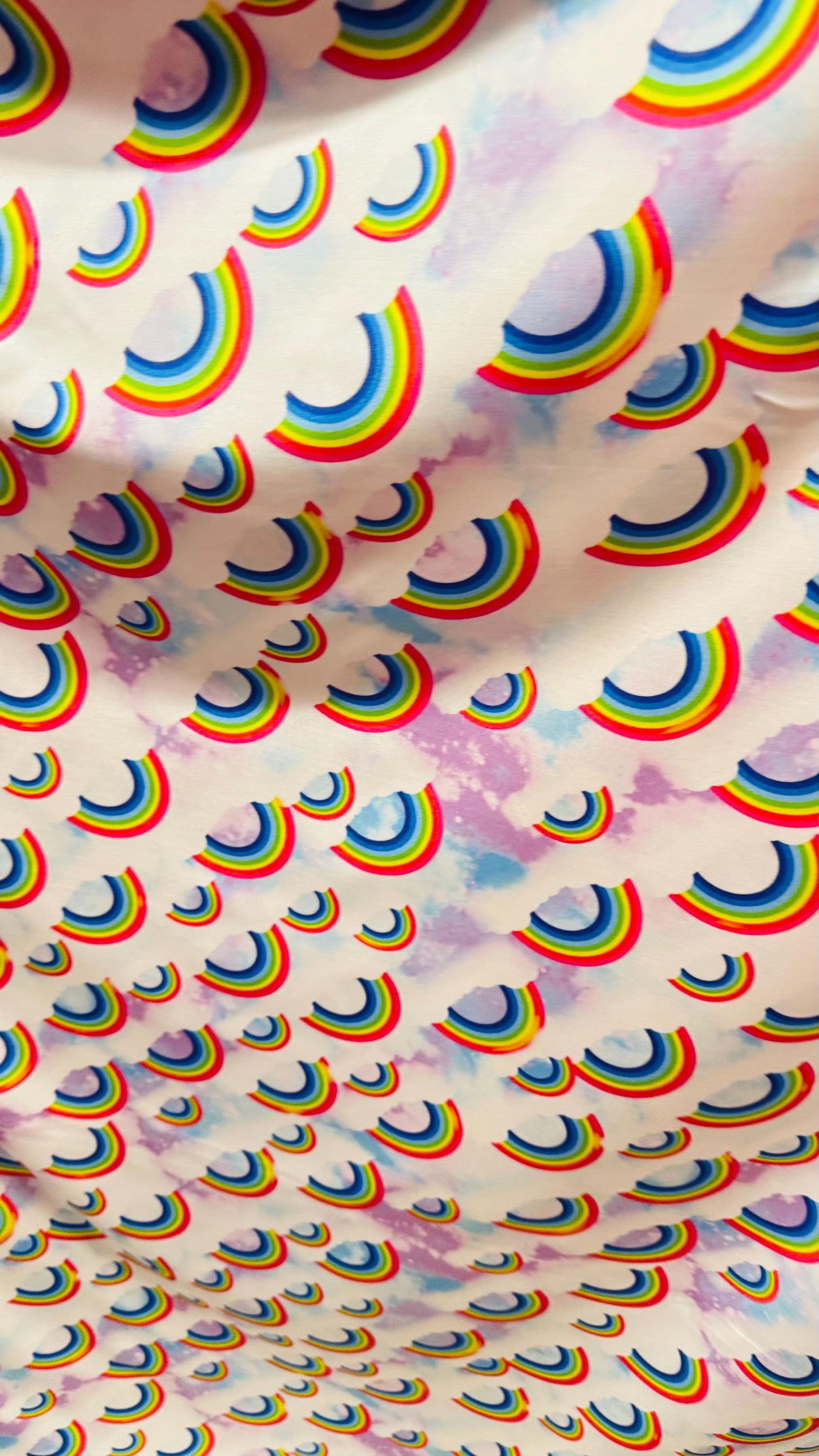 New Rainbow Clouds design print on nylon spandex 4way Stretch 58/60" Sold by the YD. Ships worldwide from Los Ángeles California USA.