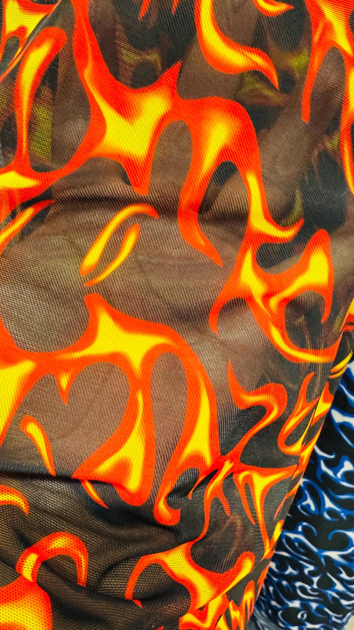 New modern fire flame design print on great quality of power mesh 4-way stretch 58/60” Sold by the YD. Ships Worldwide from Los Angeles CA.
