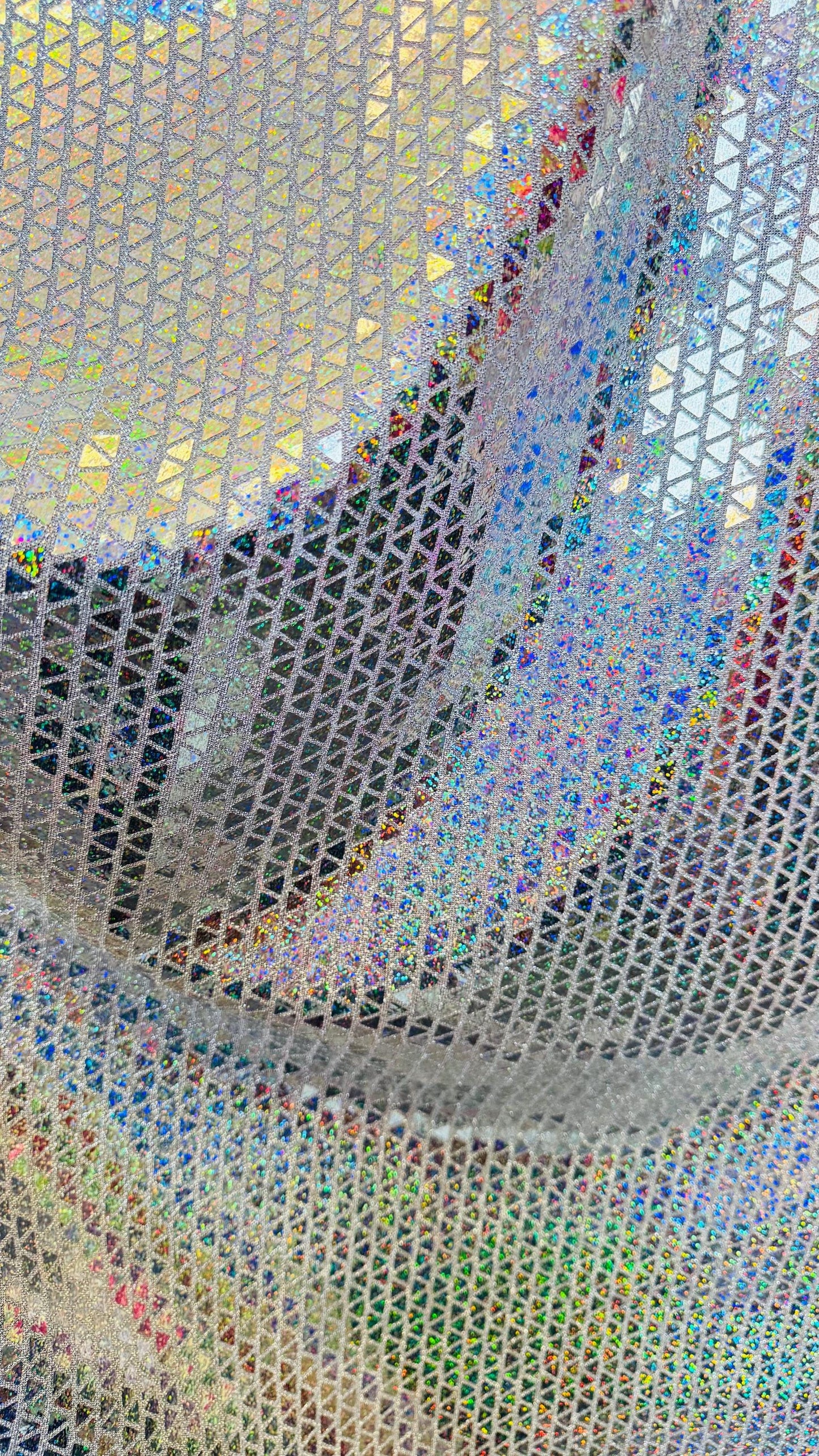 New Triangle Geometric Hologram sequins on metallic base non stretch 44/45" Sold by the YD. Ships worldwide from Los Angeles California USA