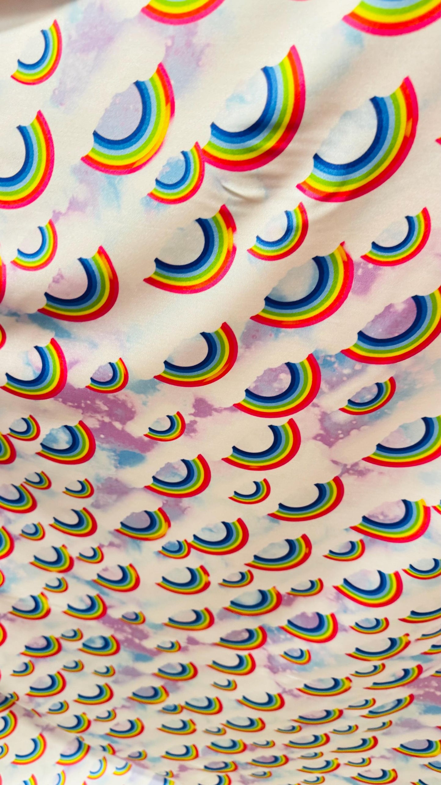 New Rainbow Clouds design print on nylon spandex 4way Stretch 58/60" Sold by the YD. Ships worldwide from Los Ángeles California USA.