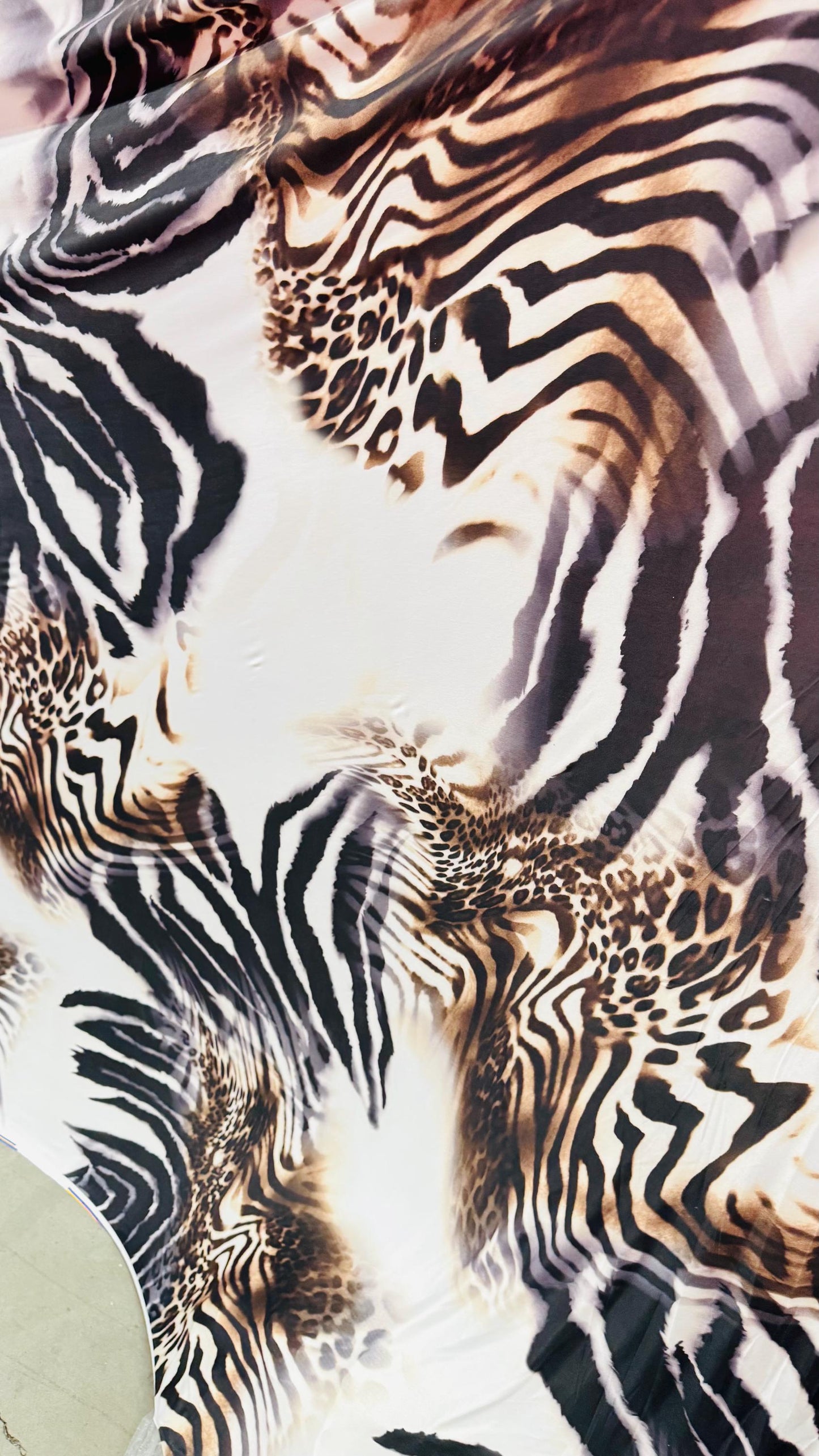 New Safari design Taupe/Brown print on poly spandex 4way stretch 58/60" Sold by the yd. Ships worldwide from Los Angeles California USA.