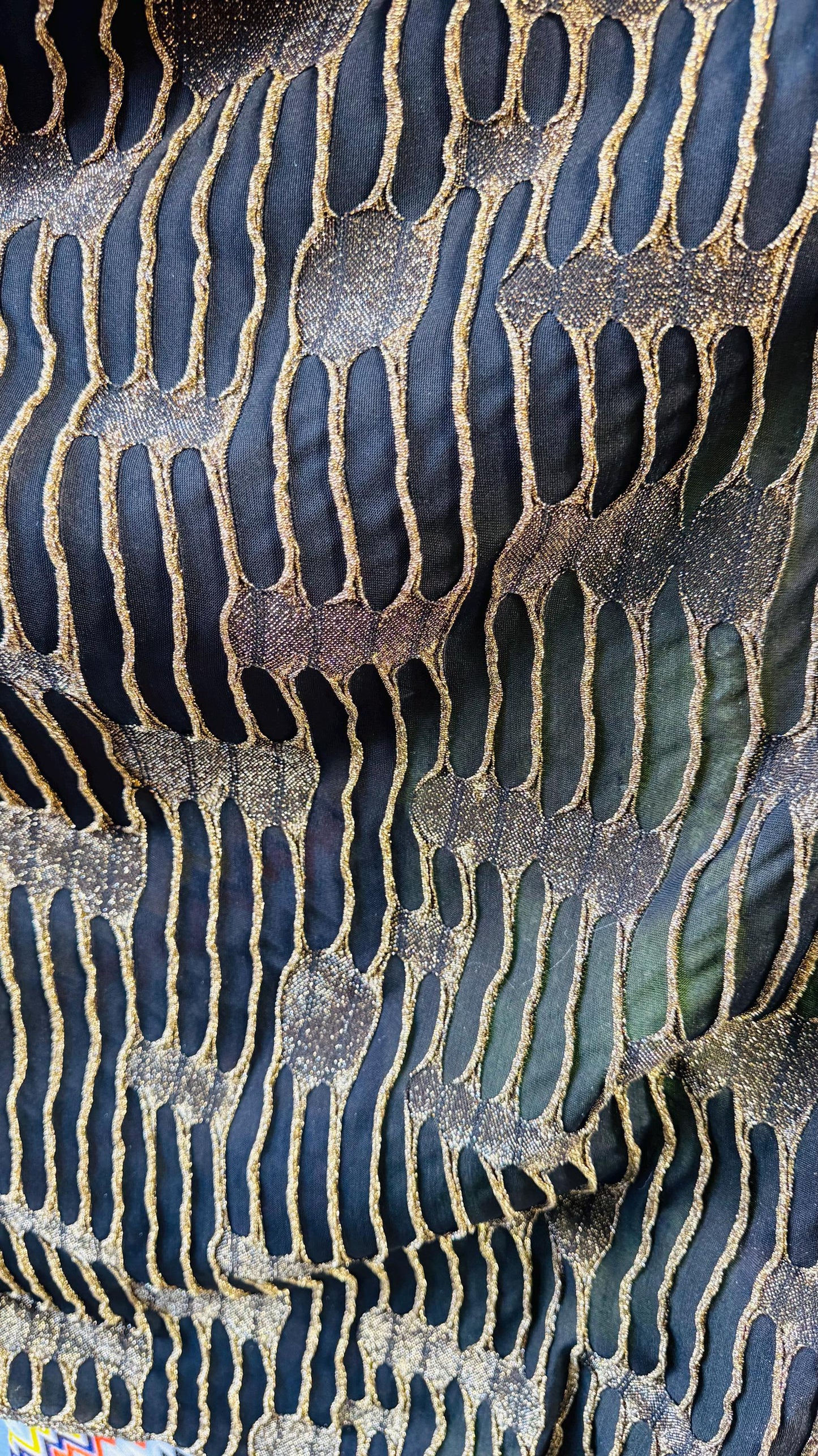 Mummy design Metallic poly spandex 4-way stretch 58/60” Sold by the YD. Ships Worldwide from Los Angeles California USA