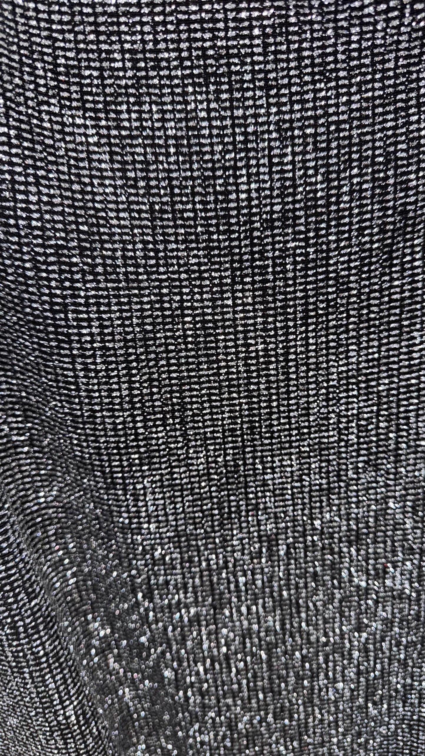 Slinky Geometric design with glitter black/silver 4way stretch 58/60" Sold by the YD. Ships worldwide from Los Angeles California USA.