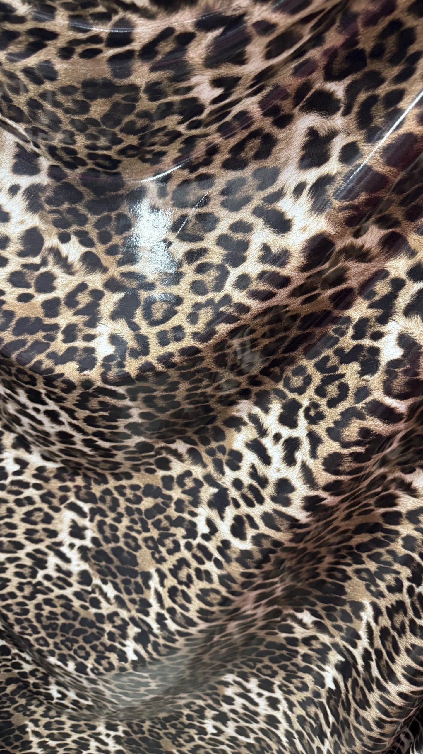 Leopard Exotic design shiny latex high quality nylon spandex vinyl 4-way stretch 58/60” Sold by the YD. Ships worldwide from Los Angeles CA
