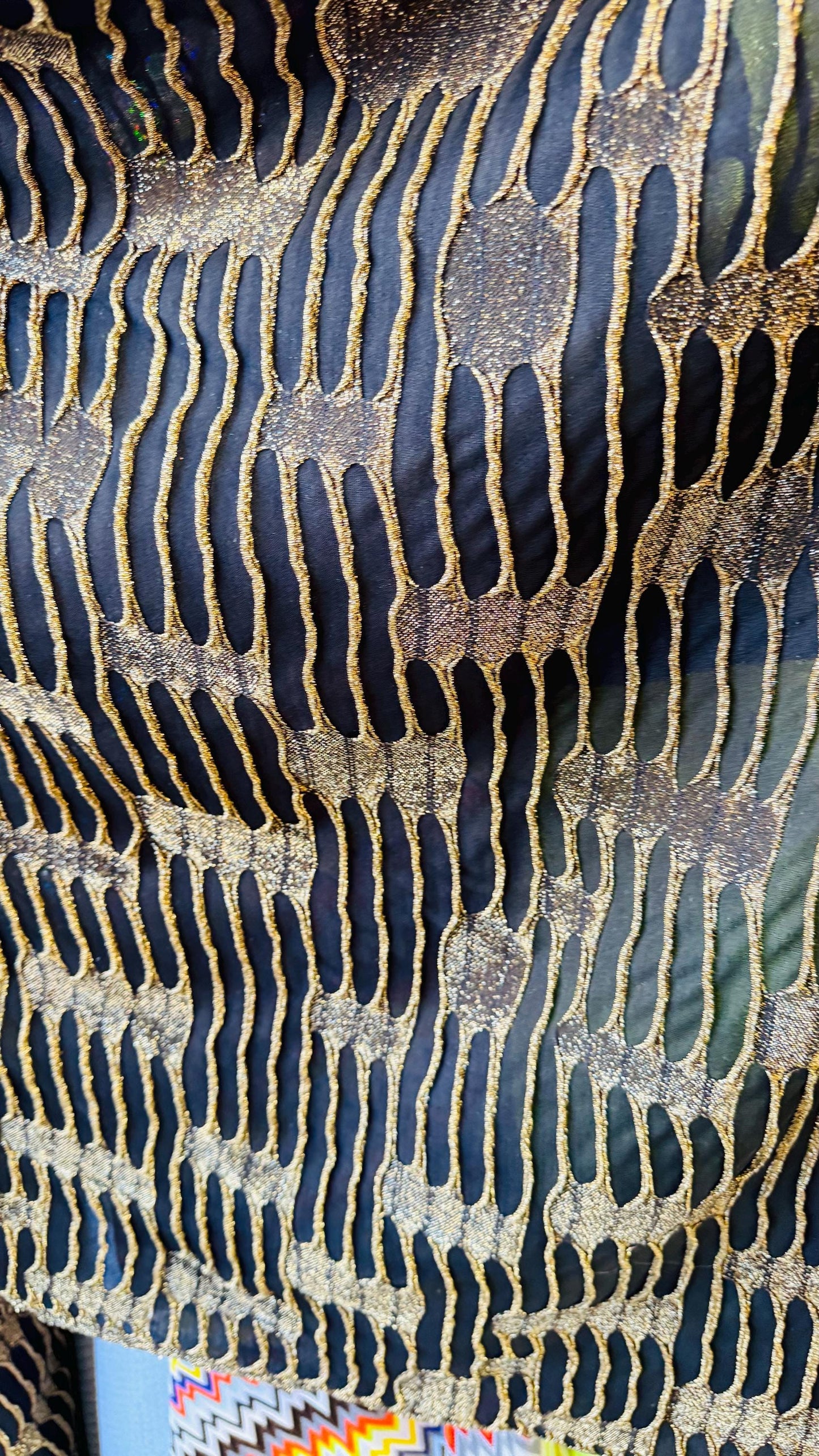Mummy design Metallic poly spandex 4-way stretch 58/60” Sold by the YD. Ships Worldwide from Los Angeles California USA