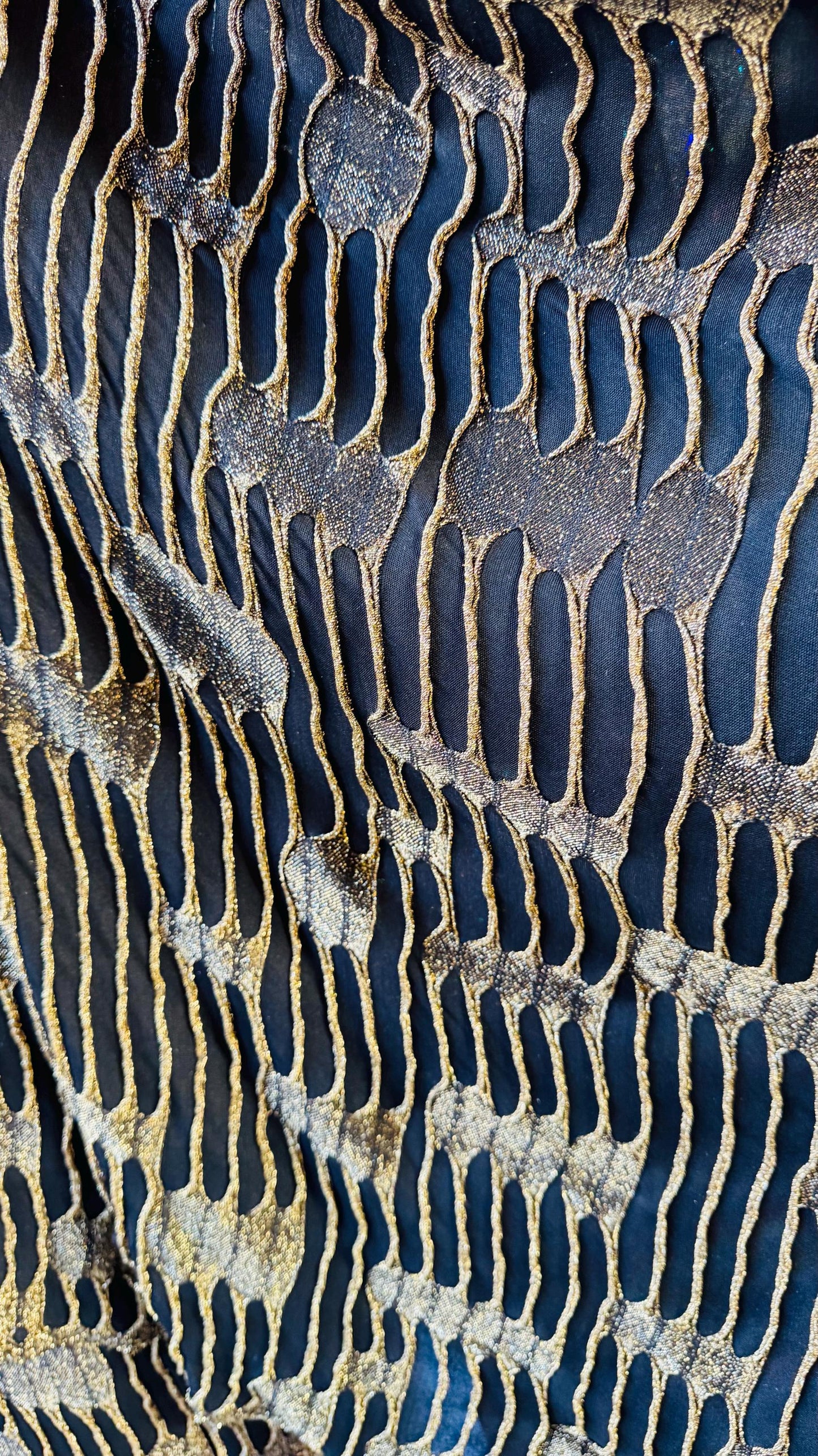 Mummy design Metallic poly spandex 4-way stretch 58/60” Sold by the YD. Ships Worldwide from Los Angeles California USA