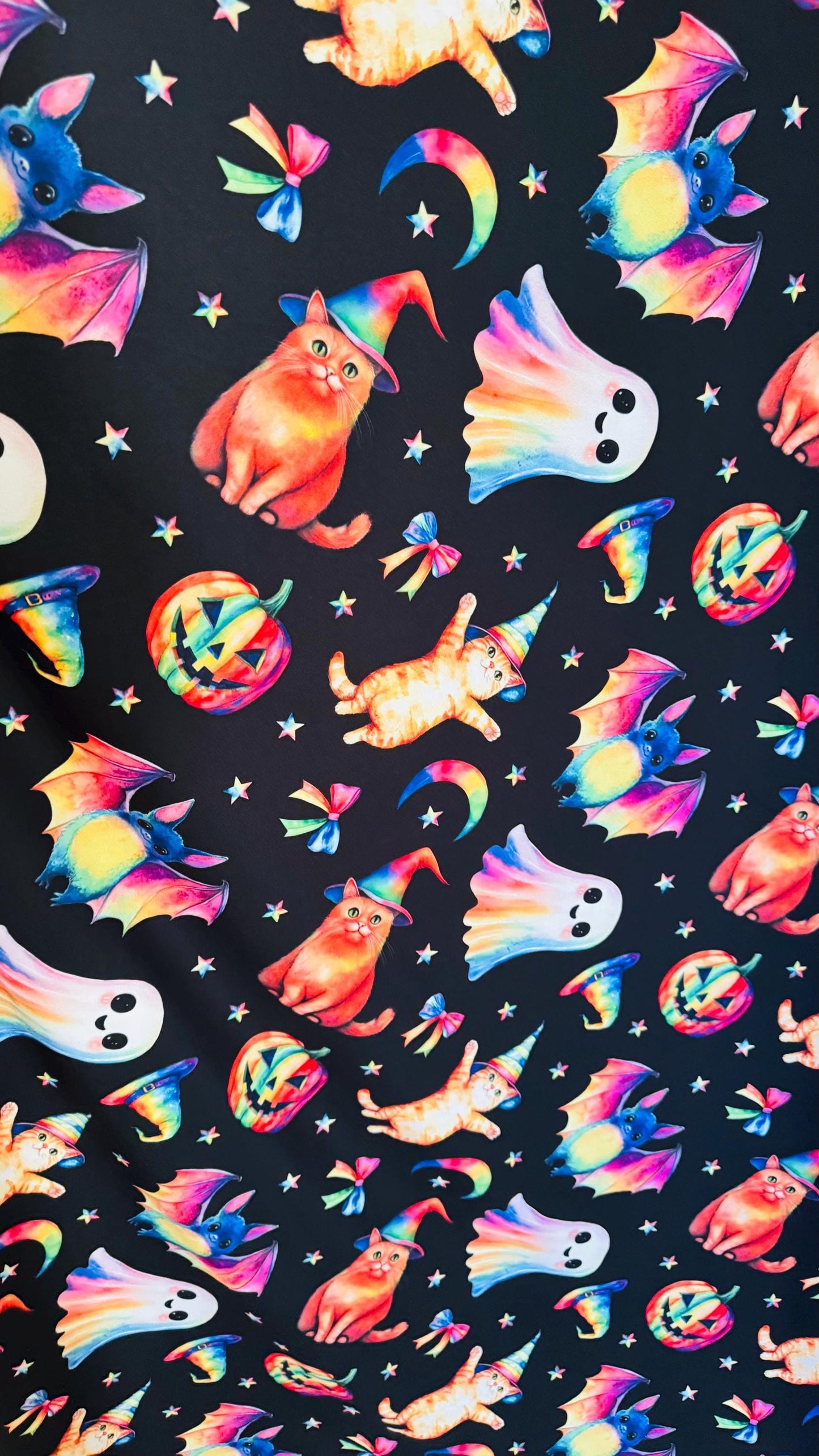 Halloween Multi designs Black/Rainbow print on Poly Spandex 4-way stretch 58/60” Sold by the YD. Ships Worldwide from Los Angele California