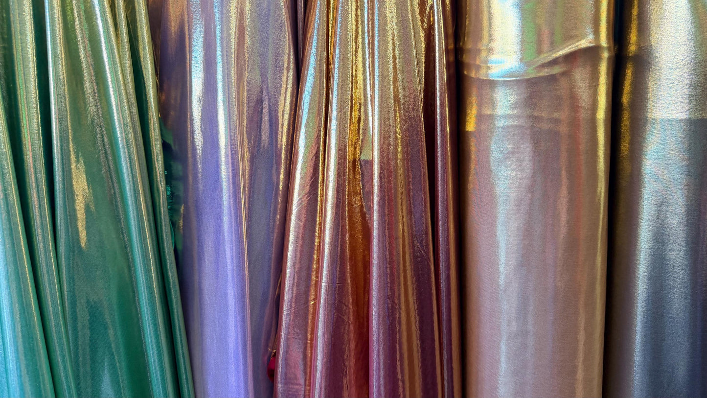 New Super Shiny metallic poly spandex with foil 2-way stretch light weight 58/60” Sold by the YD. Ships worldwide from Los Angeles Californi