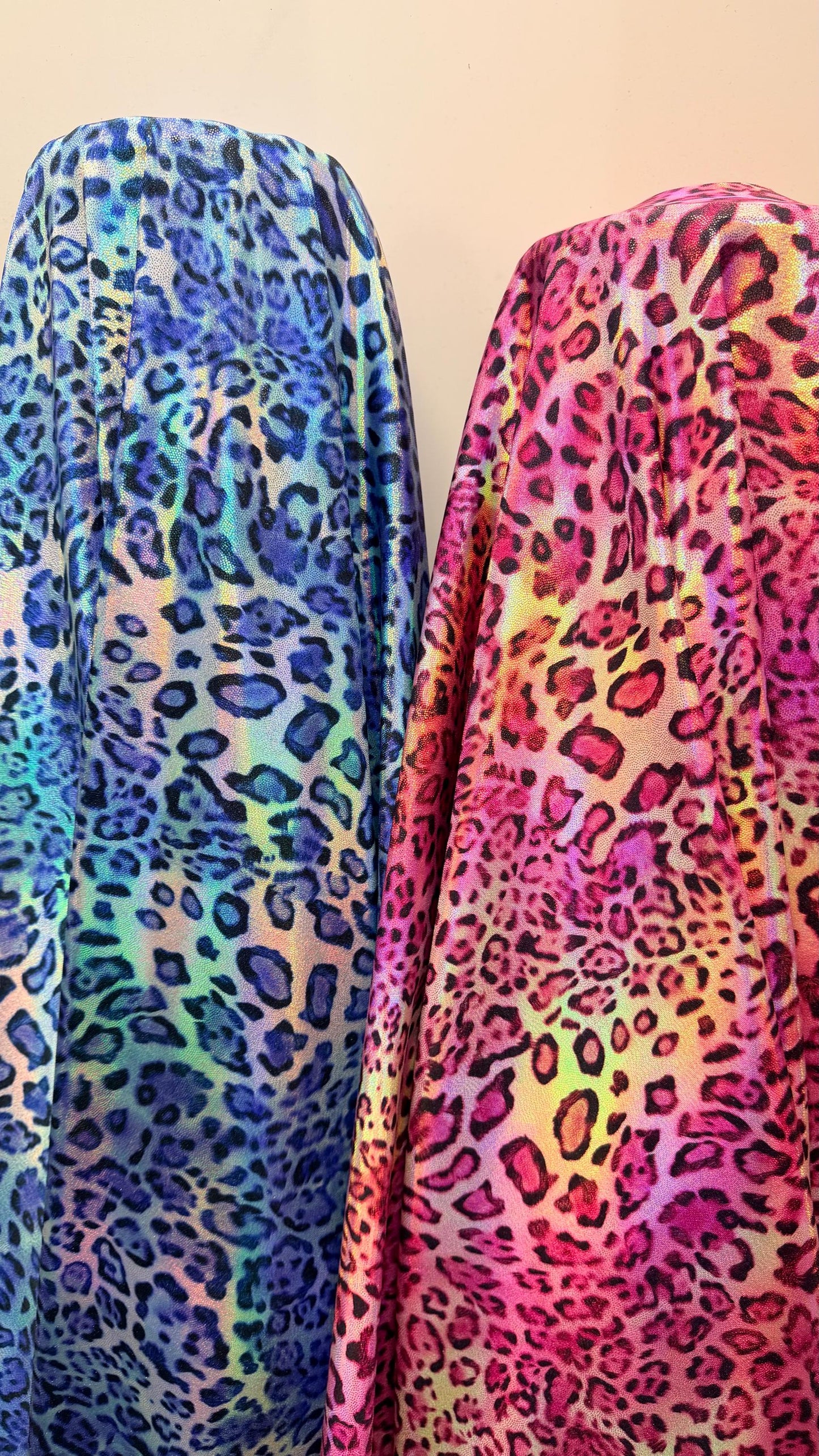 New exotic Iridescent Pug Leopard design hologram nylon spandex 4-way stretch 58/60” Sold by the YD. Ships worldwide from Los Angeles CA