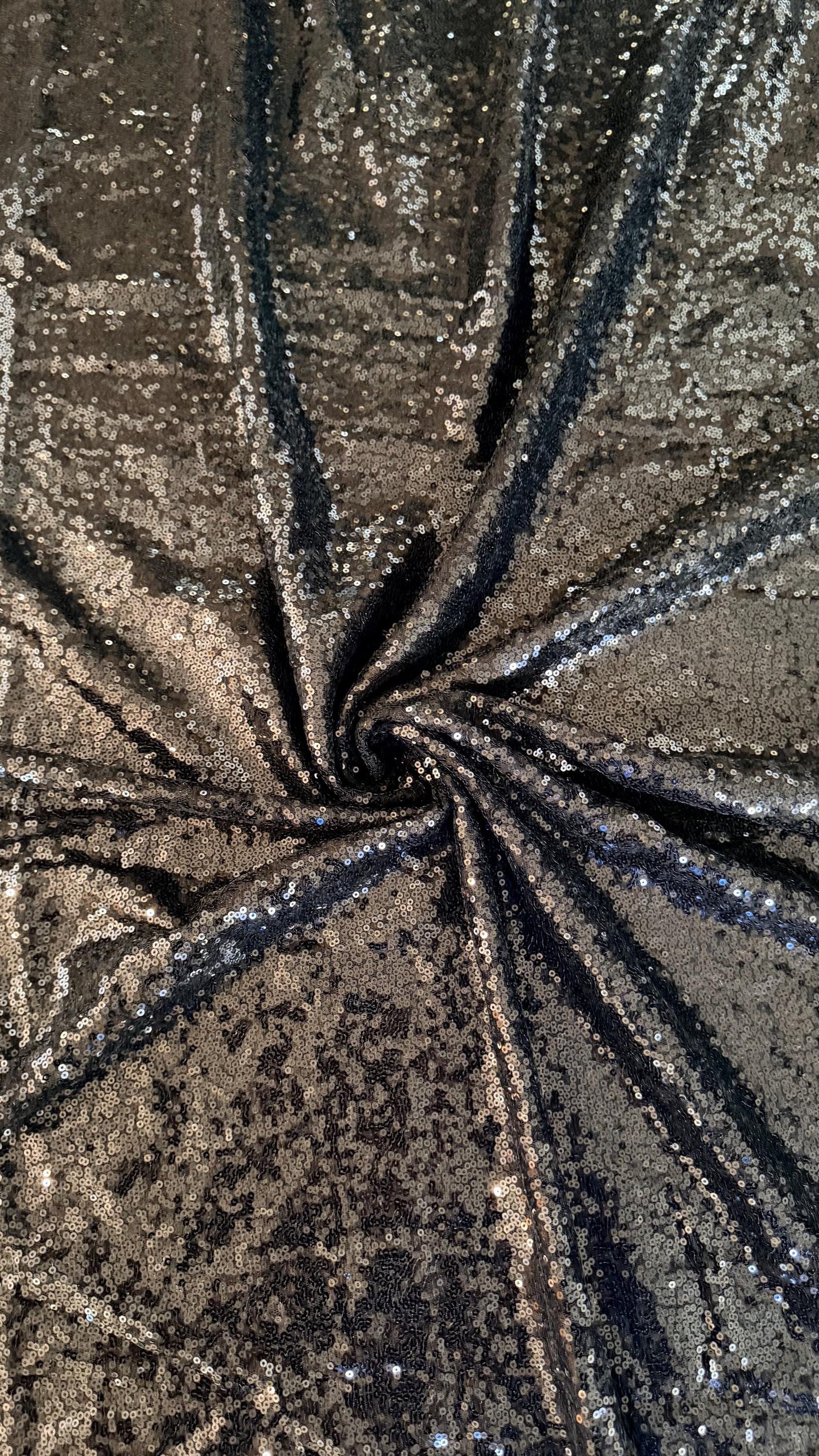 Mini cosmic glitz shiny sequins on strech mesh 2way strech 55/57" Sold by the YD. Ships worldwide from Los Angeles California USA