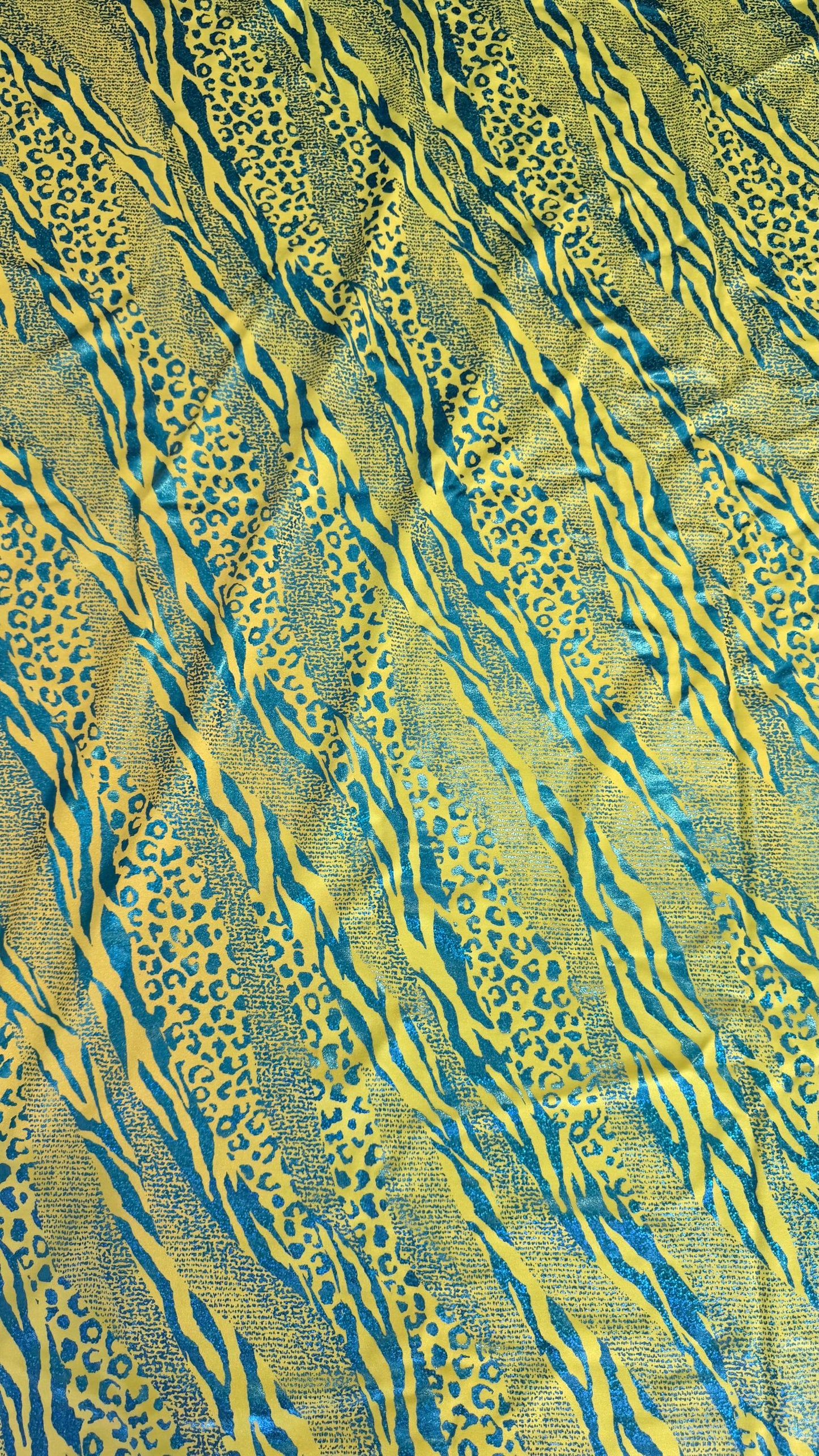 New snake safari design Iridescent Hologram 2-tone Teal/Green metallic nylon spandex 4way stretch 58/60" Sold by the YD. Ships worldwide