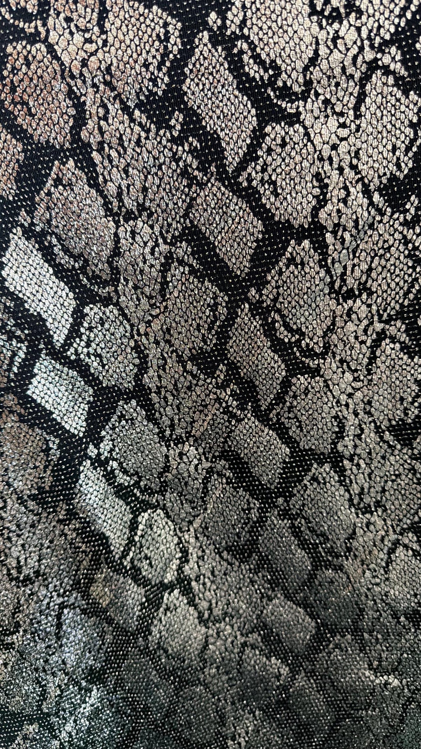 New metallic snake skin design on nylon spandex base 4 way stretch 58/60" Sold by the YD. ships worldwide from Los Angeles California USA