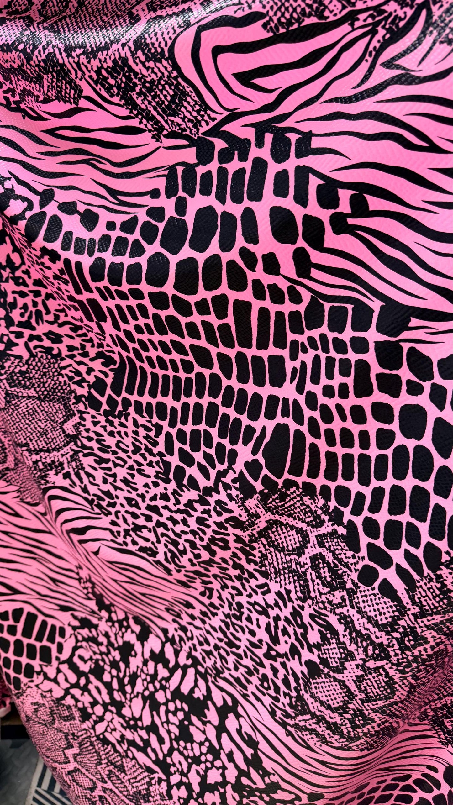 NEW Pink/black Exotic Animal print safari design nylon spandex with clear foil 4-way stretch 58/60” Sold by the YD. Ships worldwide
