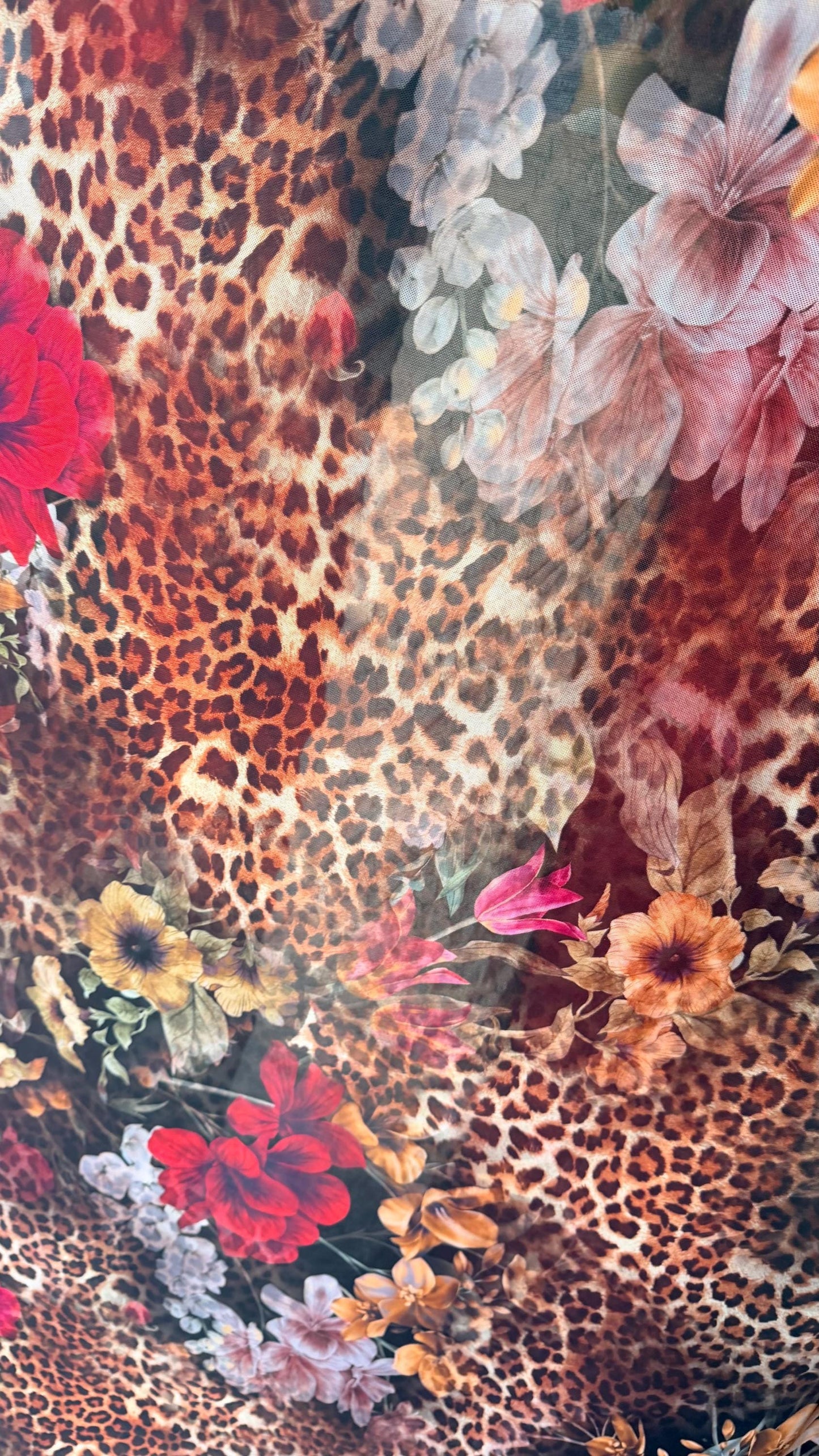 New exotic leopard design with red roses print on power mesh 4-way stretch 58/60” Sold by the YD. Ships worldwide from Los Angeles