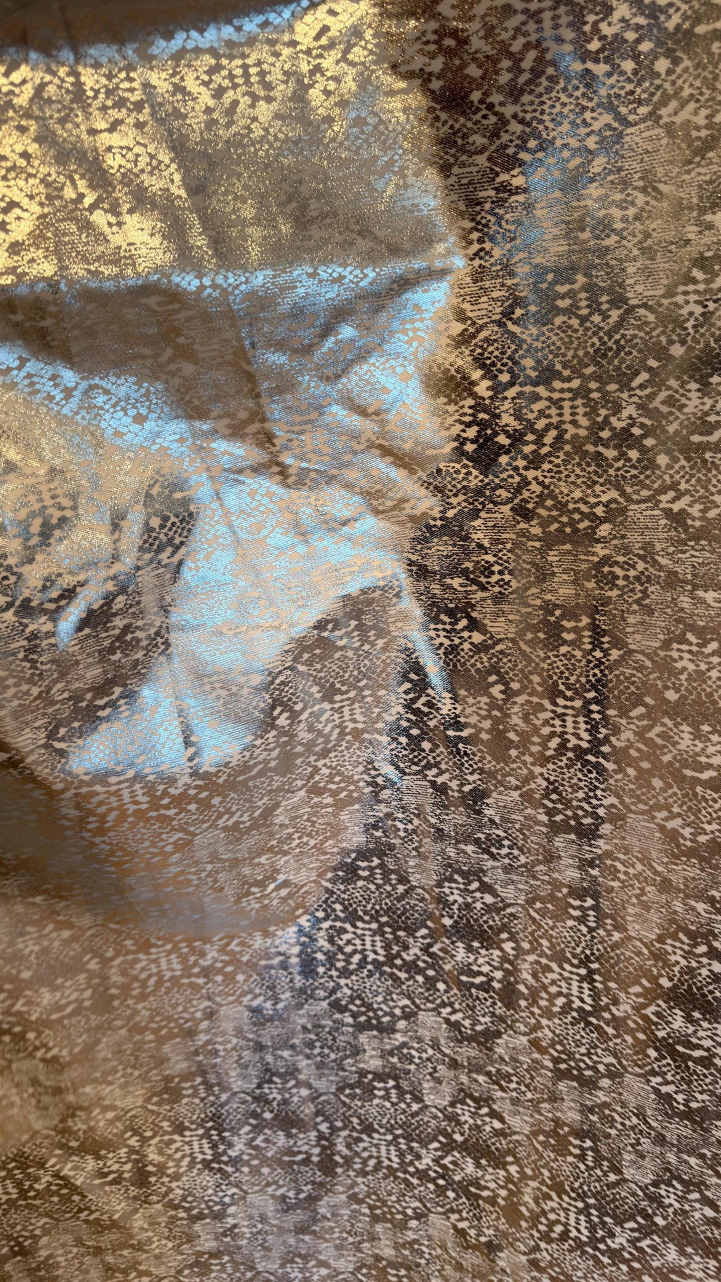 New Twill fabric Snake Design 2-way stretch with silver metallic all over foil 58/60" Sold by the YD. Ships worldwide from Los Angeles CA