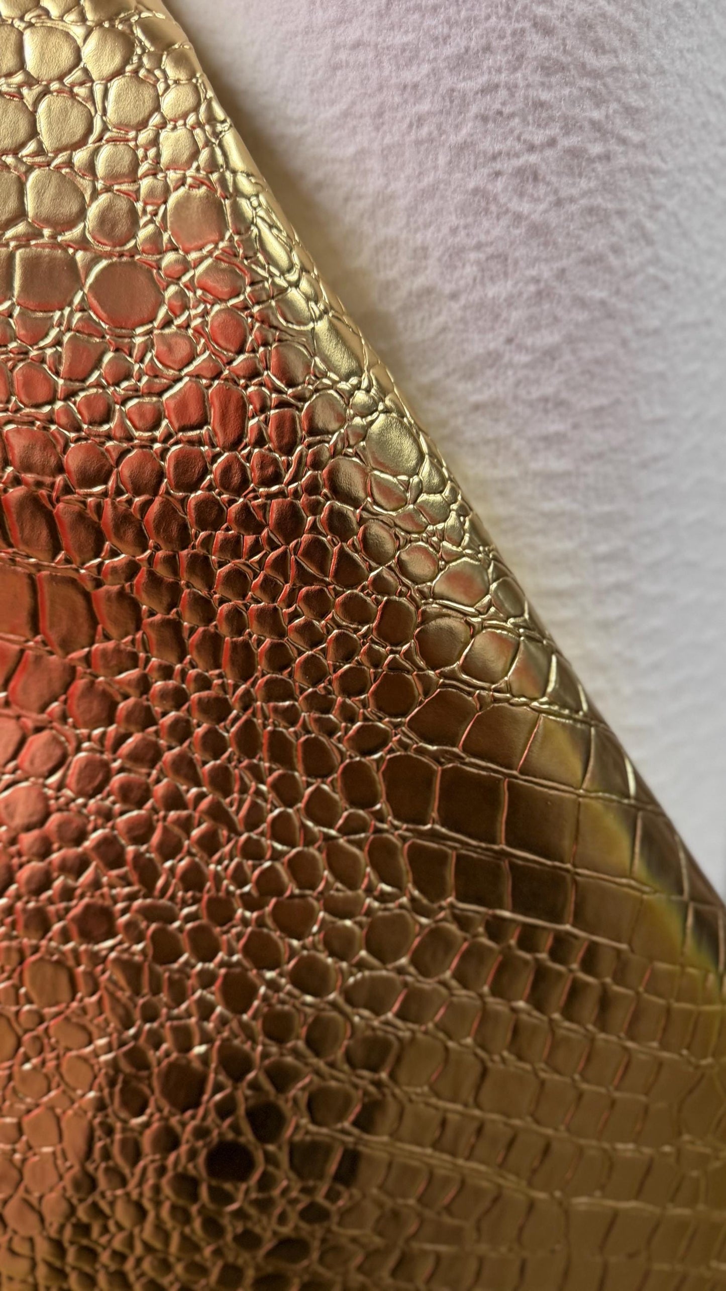 New Exotic Vinyl Crocodile design super shiny Gold Croc Skin vinyl 55/56” Sold by the YD. Ships Worldwide from Los Angeles California USA.