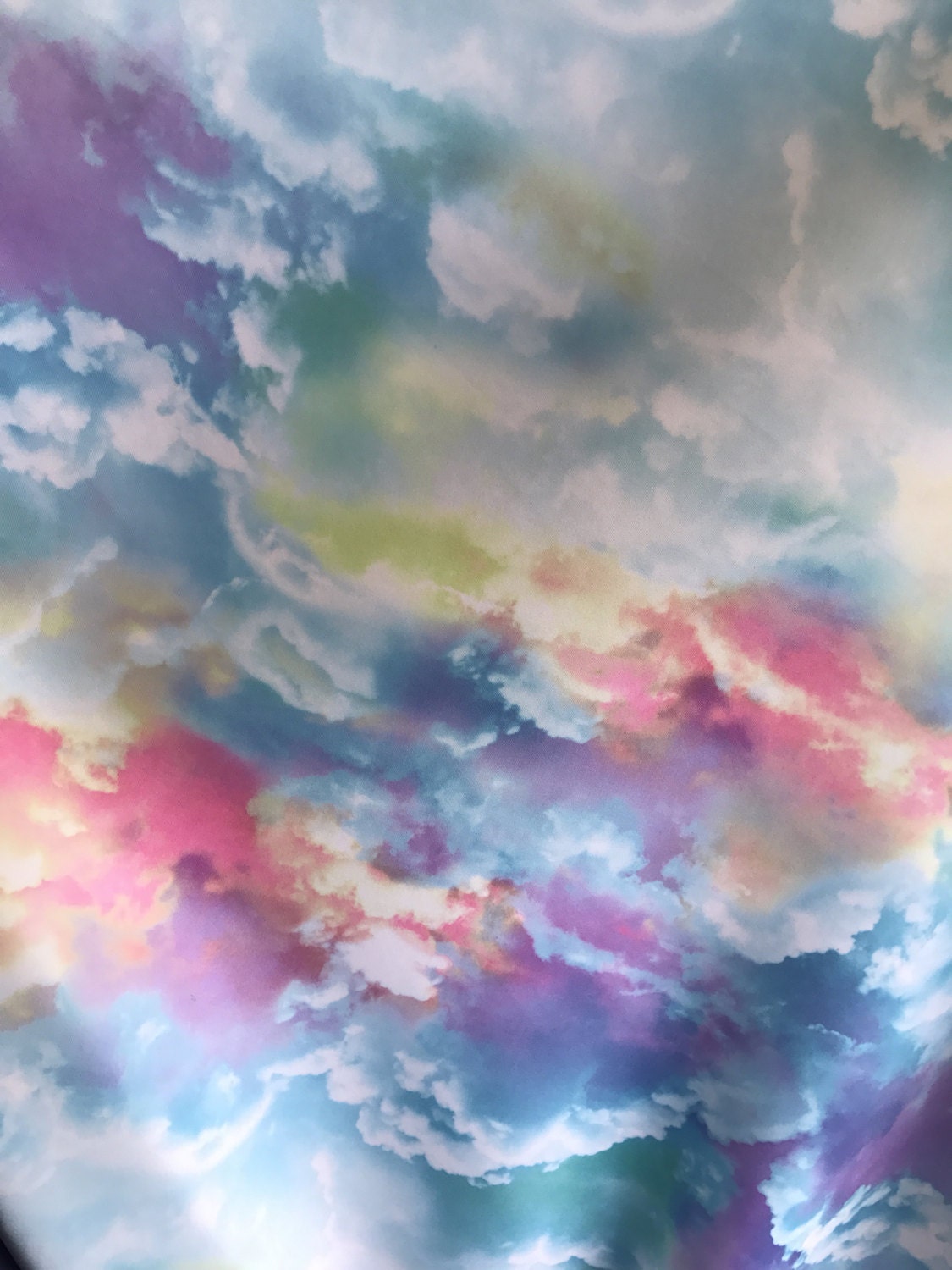 New clouds design print on nylon spandex 4way Stretch blue multicolor 58/60" Sold by the yd. Ships worldwide from Los Angeles California US